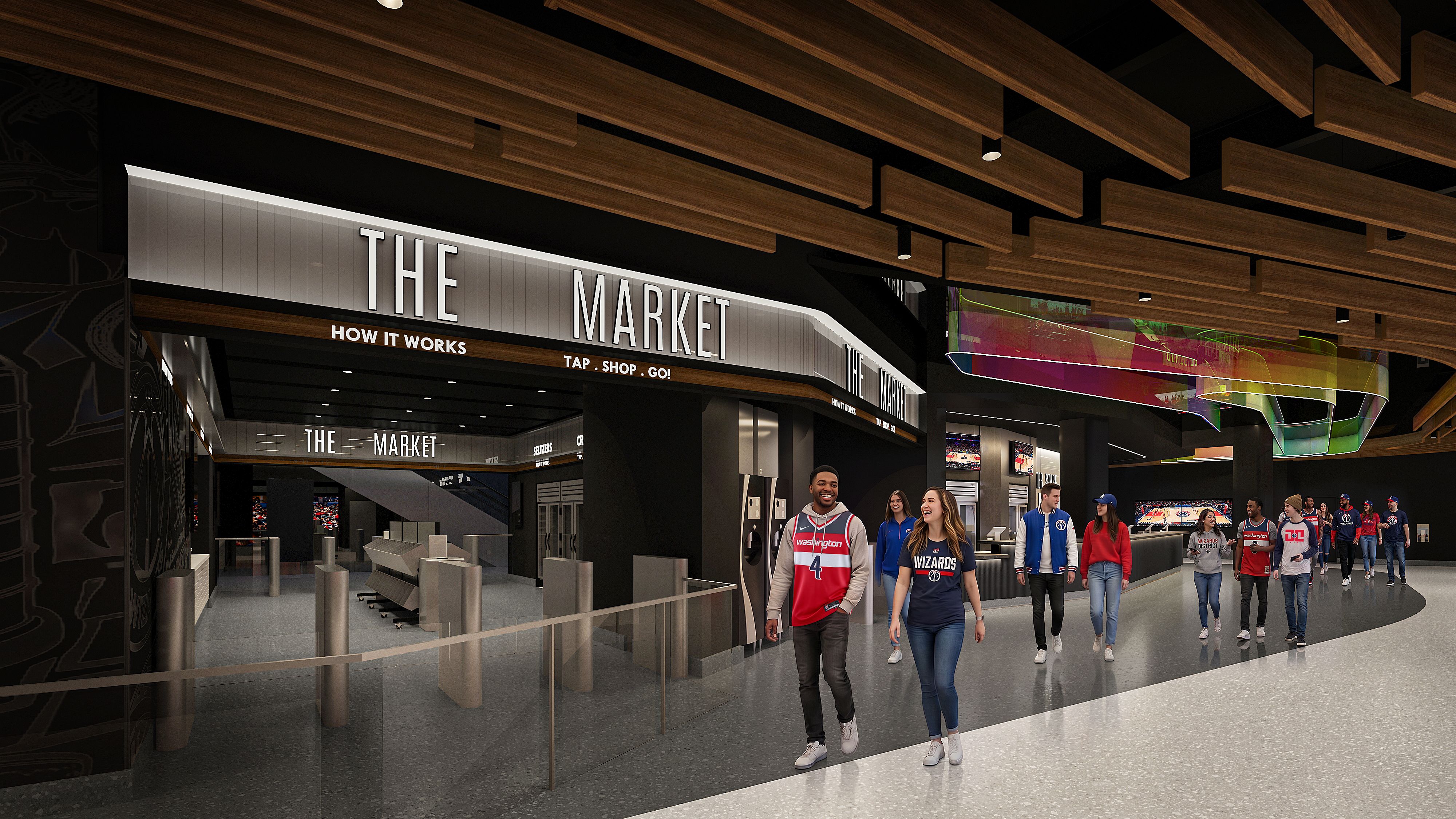 Modern market entrance with a bright sign reading THE MARKET under a wooden slat ceiling; shoppers in Wizards jerseys walk a sleek black corridor past a colorful curved glass sculpture overhead.