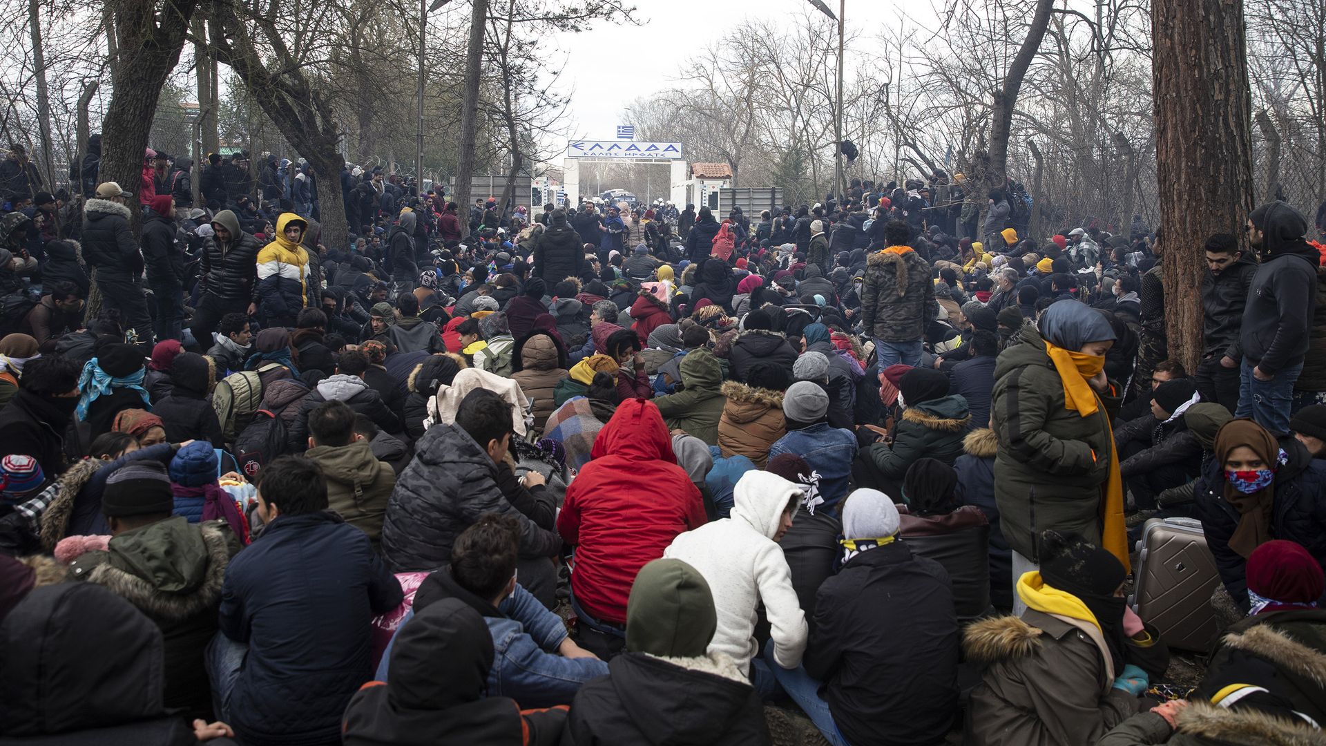 Refugees wait near to enter Europe at the Turkish-Greek border.