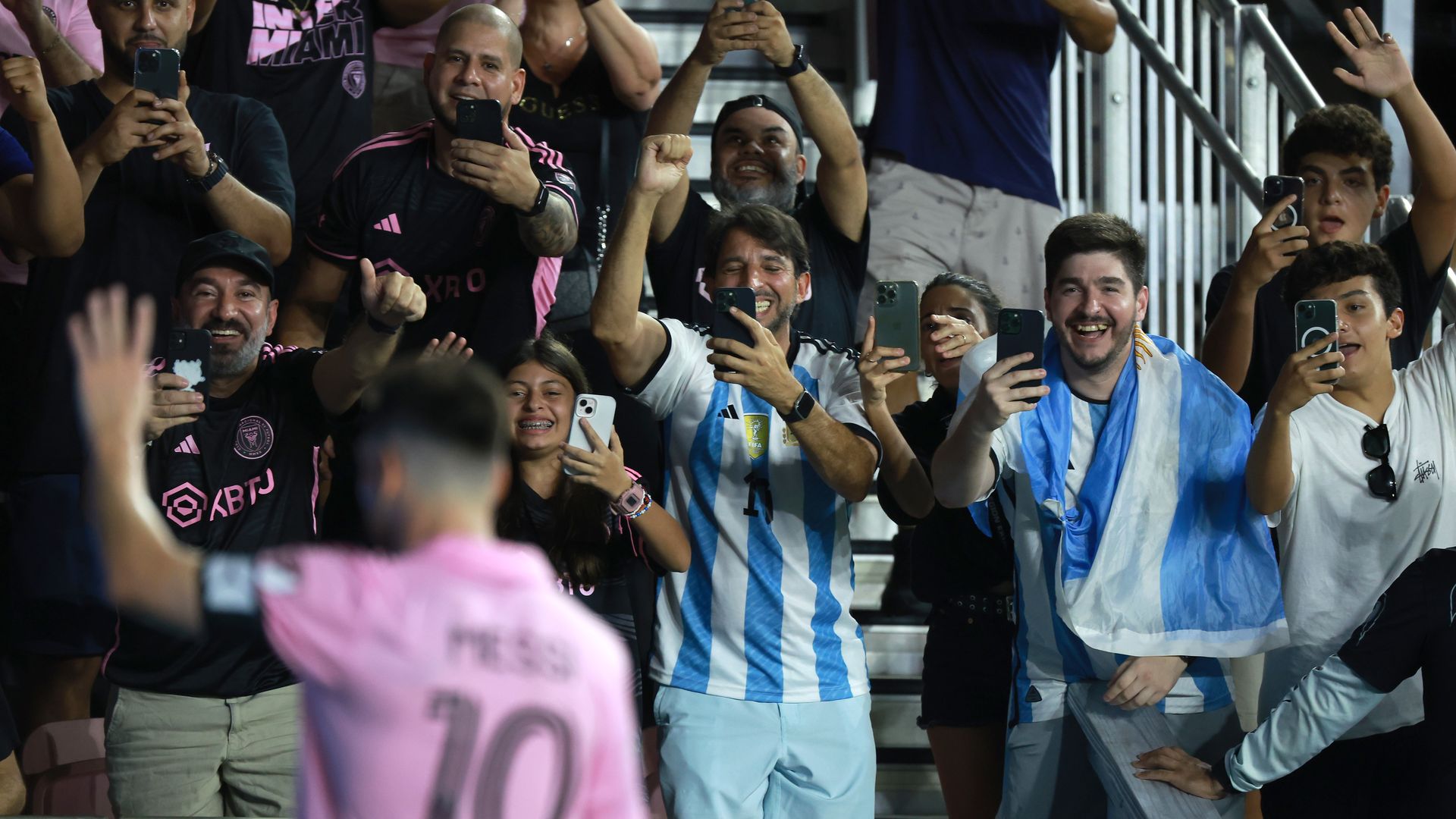 Lionel Messi waves to fans during a recent Inter Miami game.