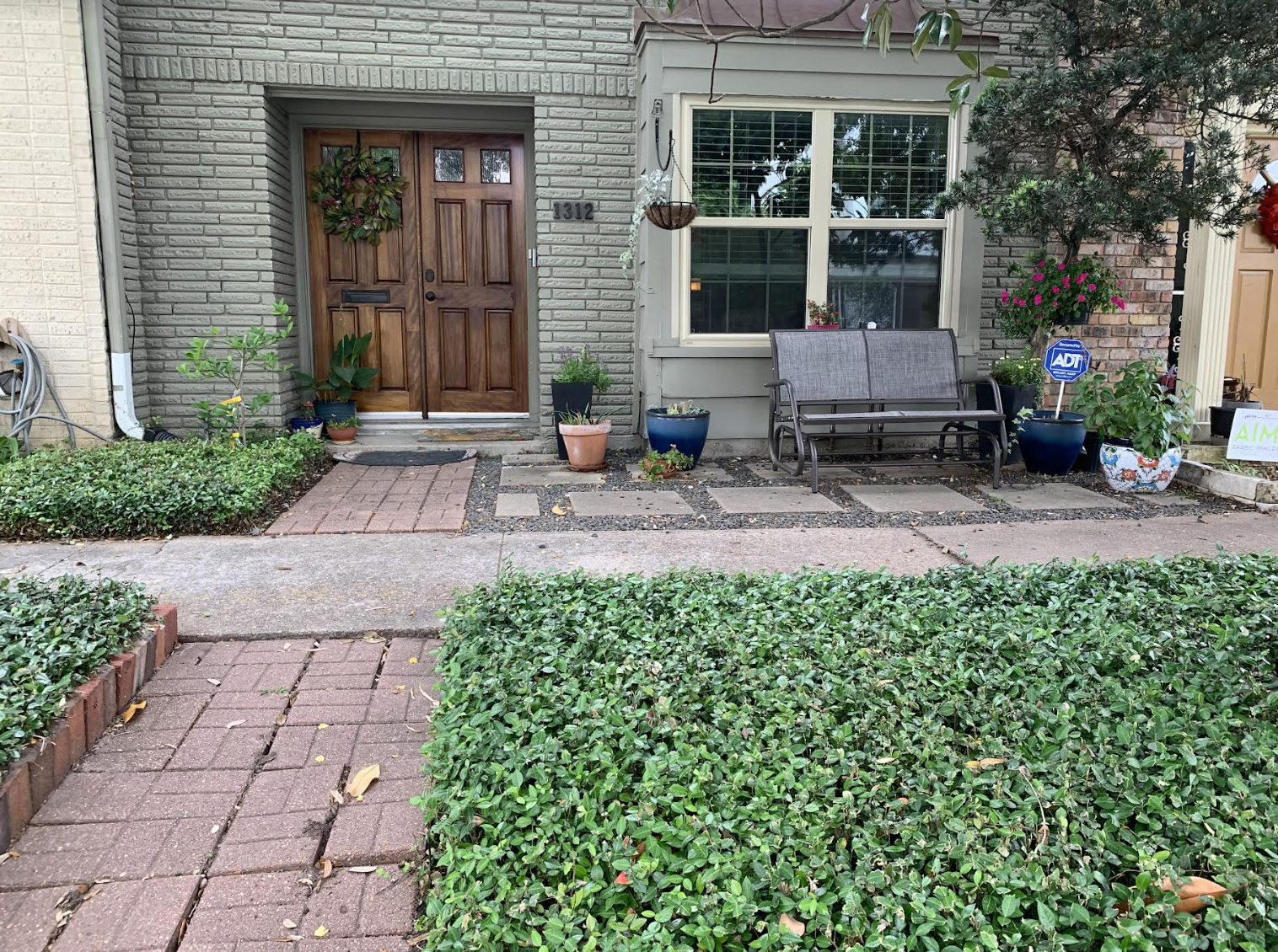 A bench outside a front door