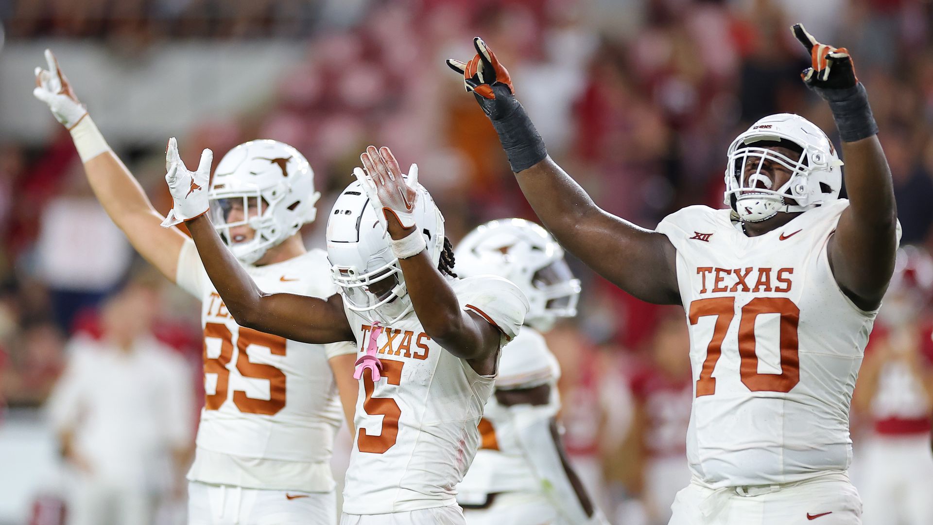 University of Texas football players celebrate.