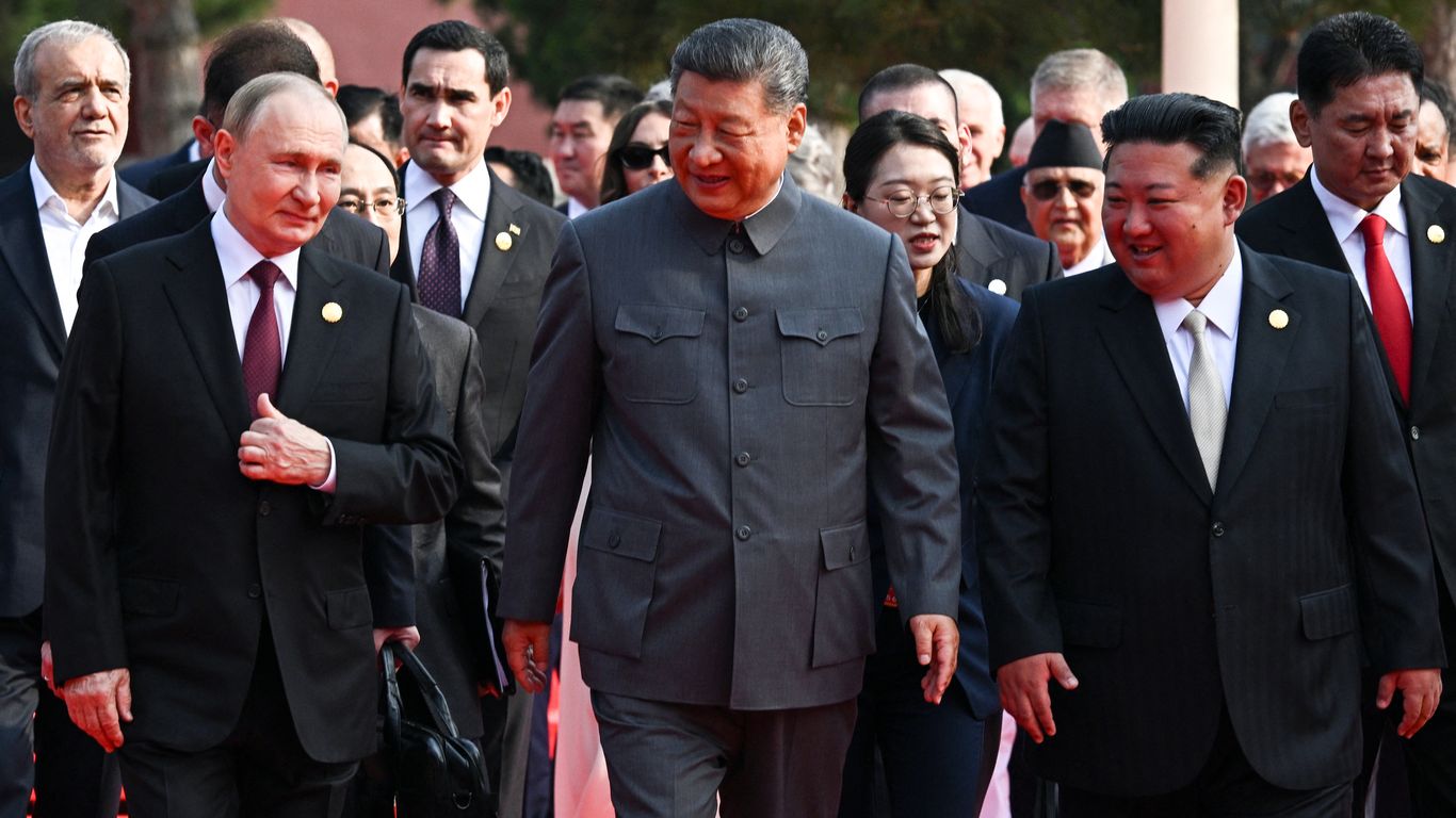 America's biggest adversaries "conspire" in Beijing