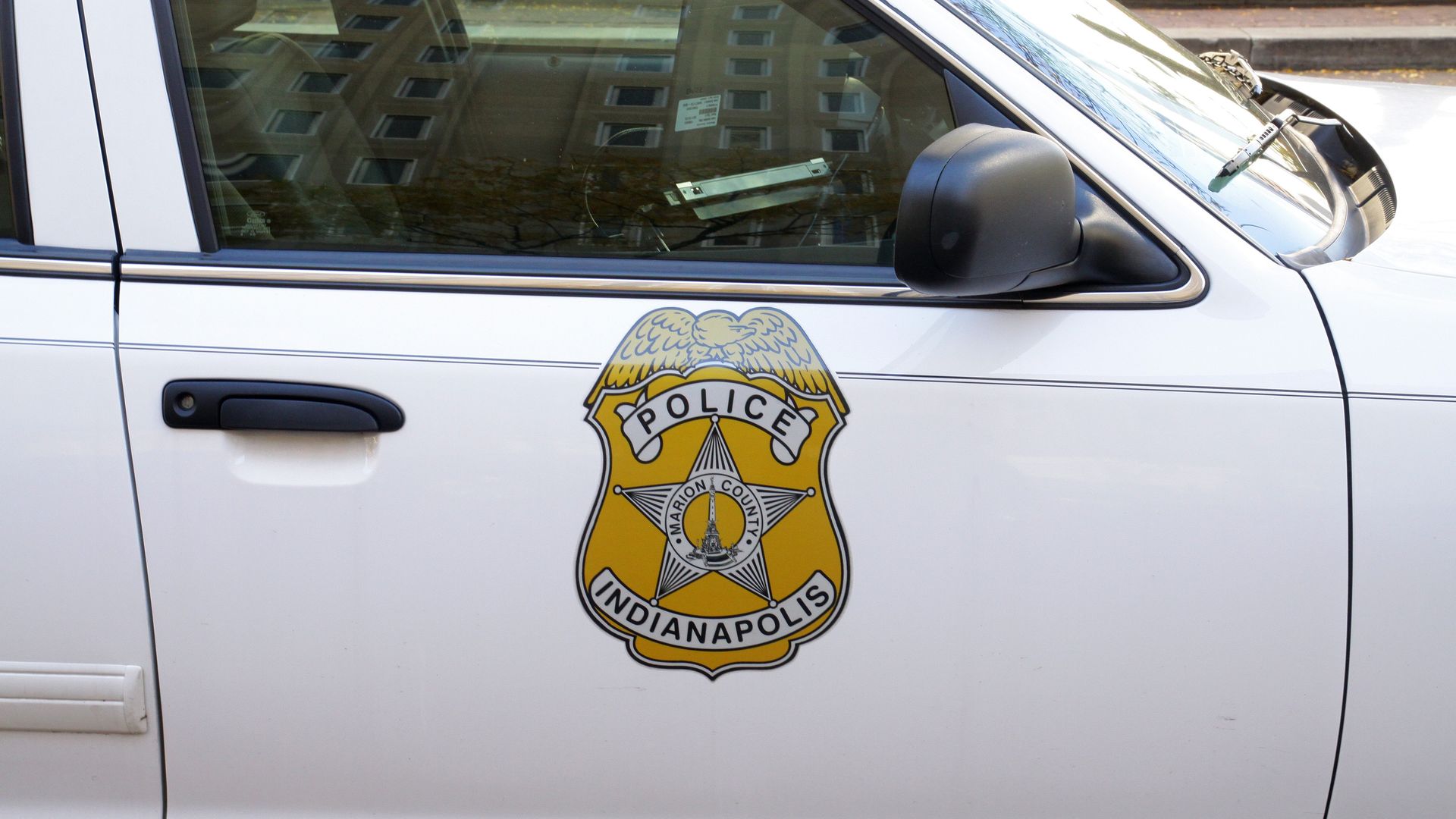 The side of an Indianapolis police car.