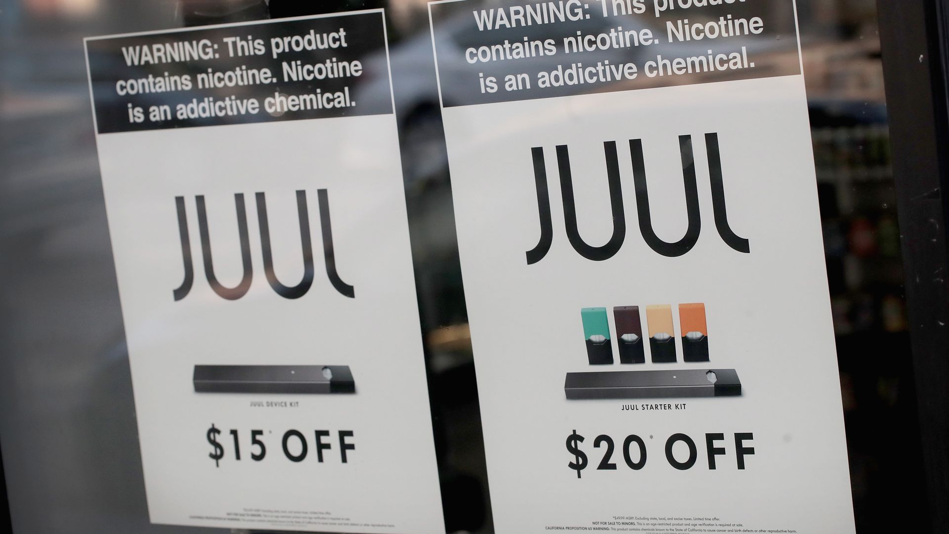 Juul signs at a storefront