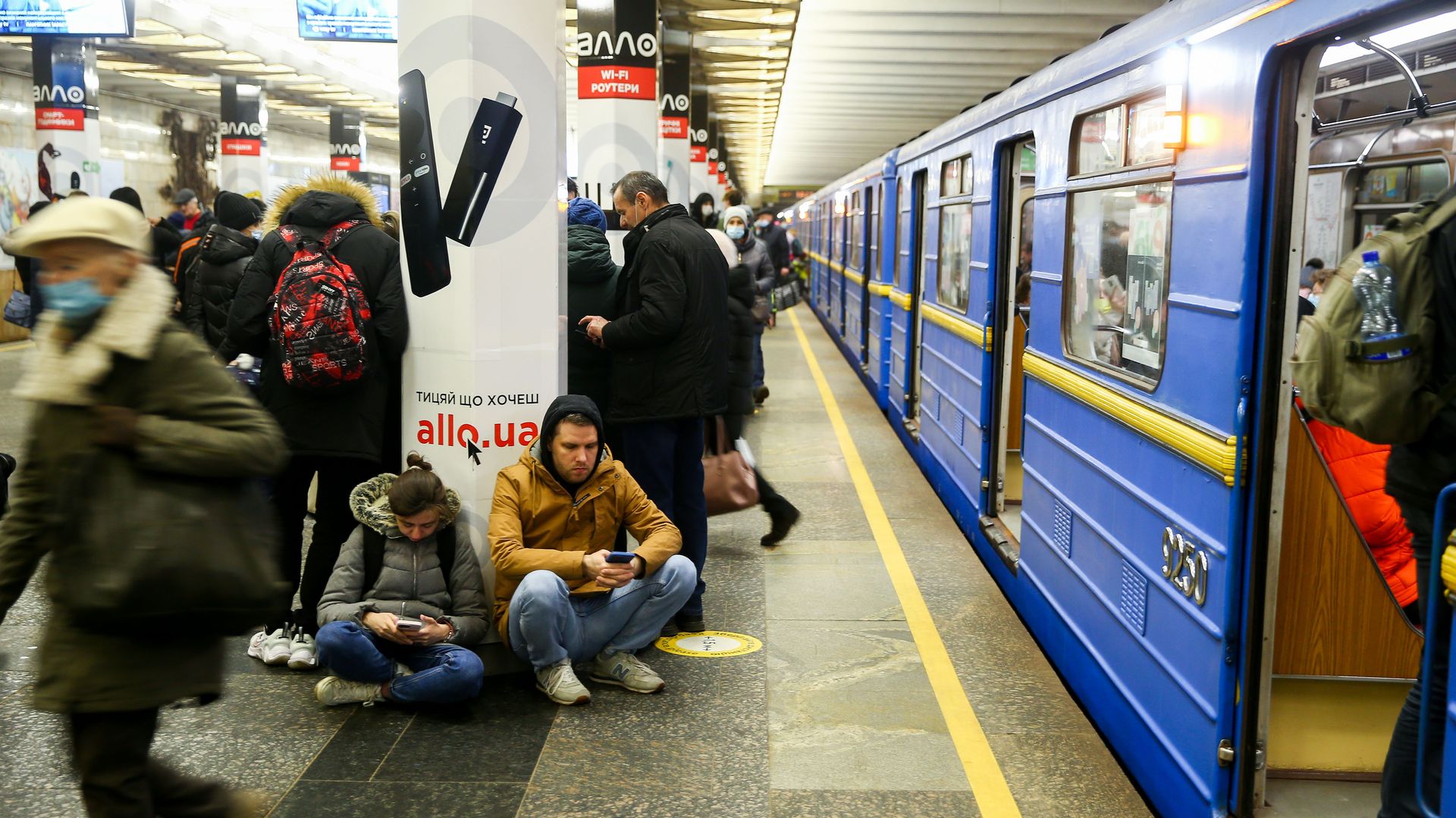 Residents of Kyiv huddle in a subway station amid Thursday's assault by Russia.