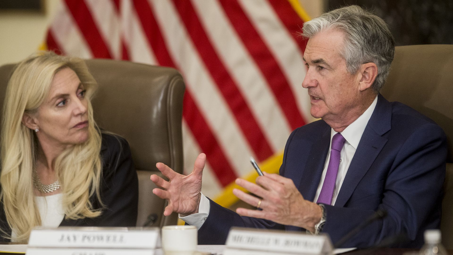 Lael Brainard is seen with Federal Reserve Chairman Jerome Powell.