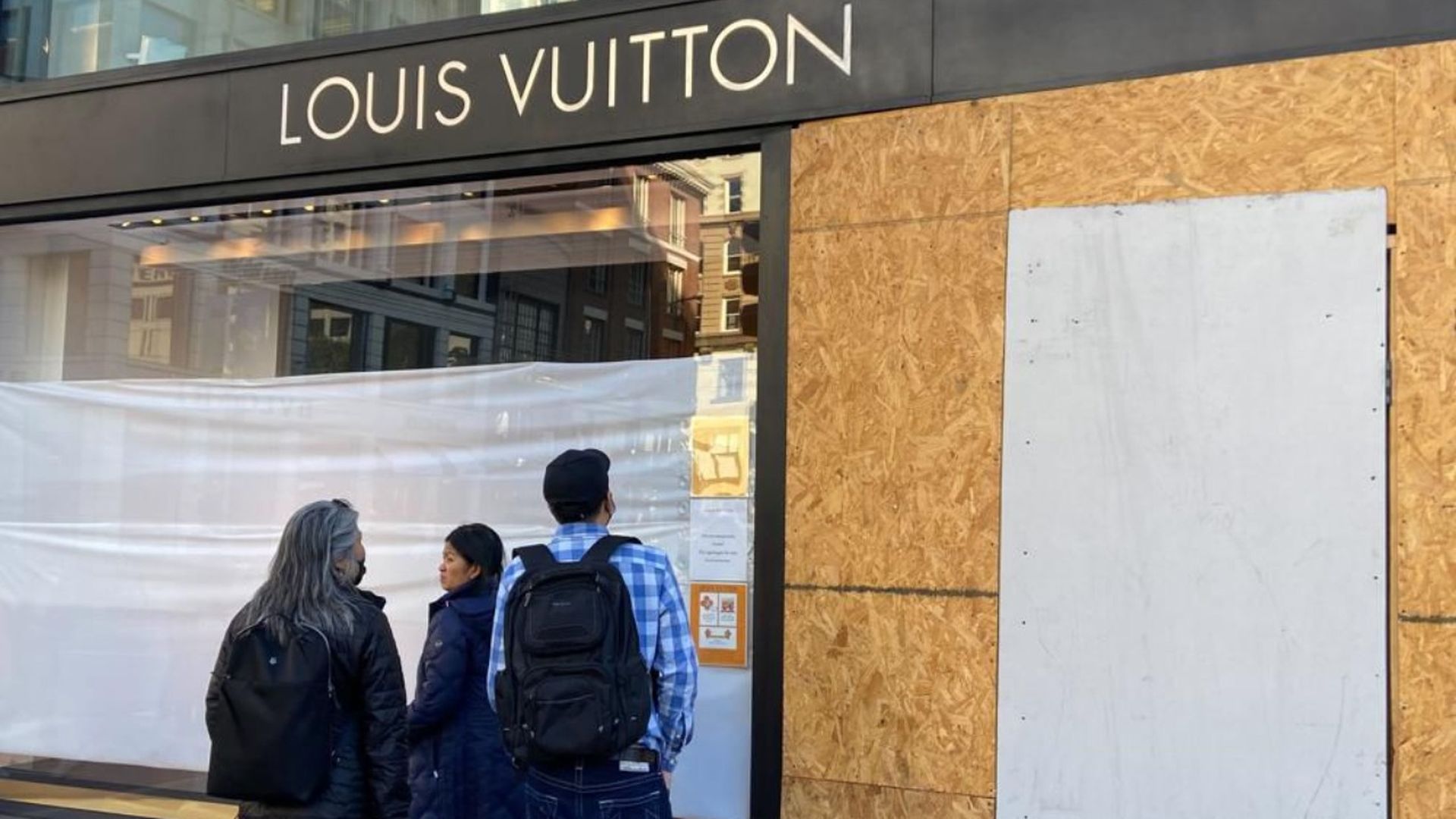 Damage is seen Sunday at the Louis Vuitton store in Union Square, San Francisco.