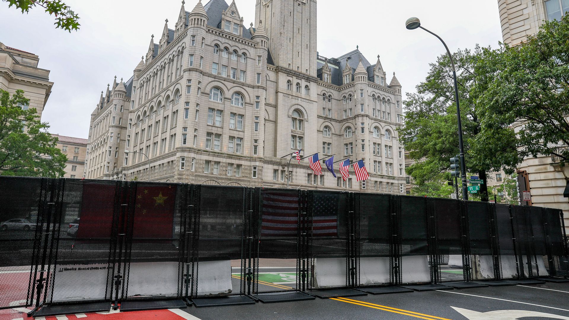 Black barriers close off roads around the Waldorf Astoria Hotel.