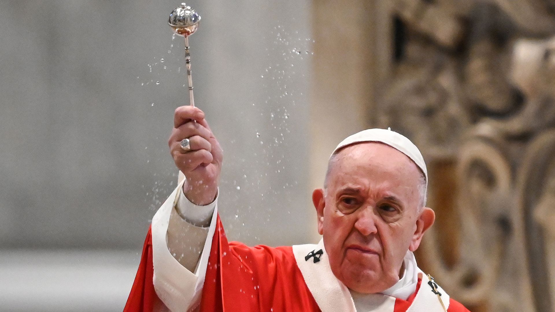 Pope Francis blesses attendees as he celebrates Palm Sunday