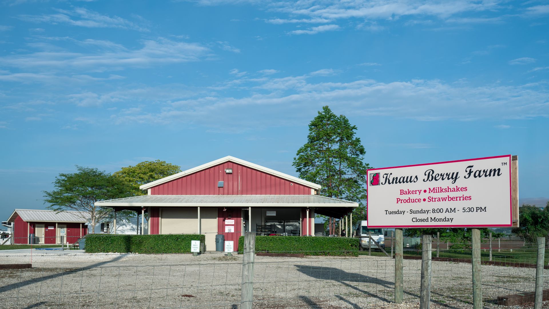 An image of a farm stand with a sign that reads Knaus Berry Farm
