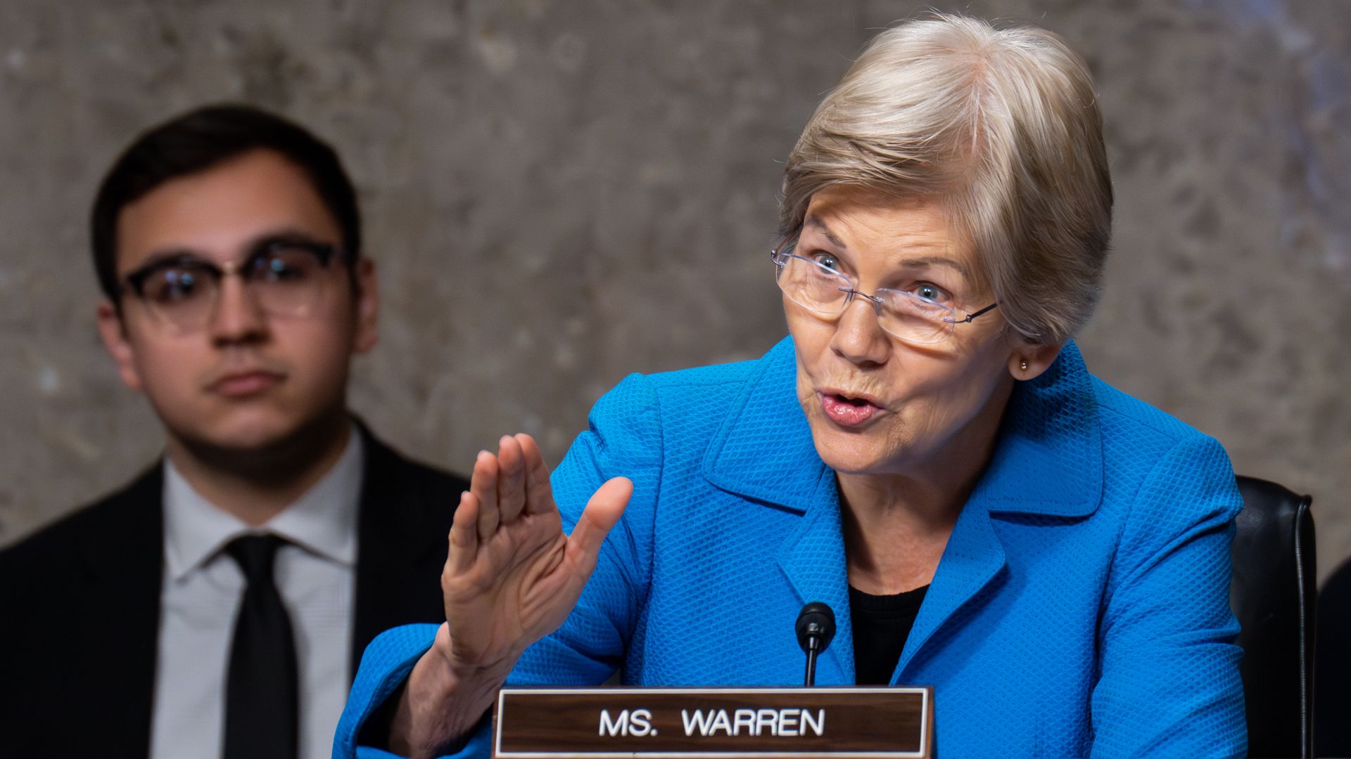 A person speaks at a congressional hearing