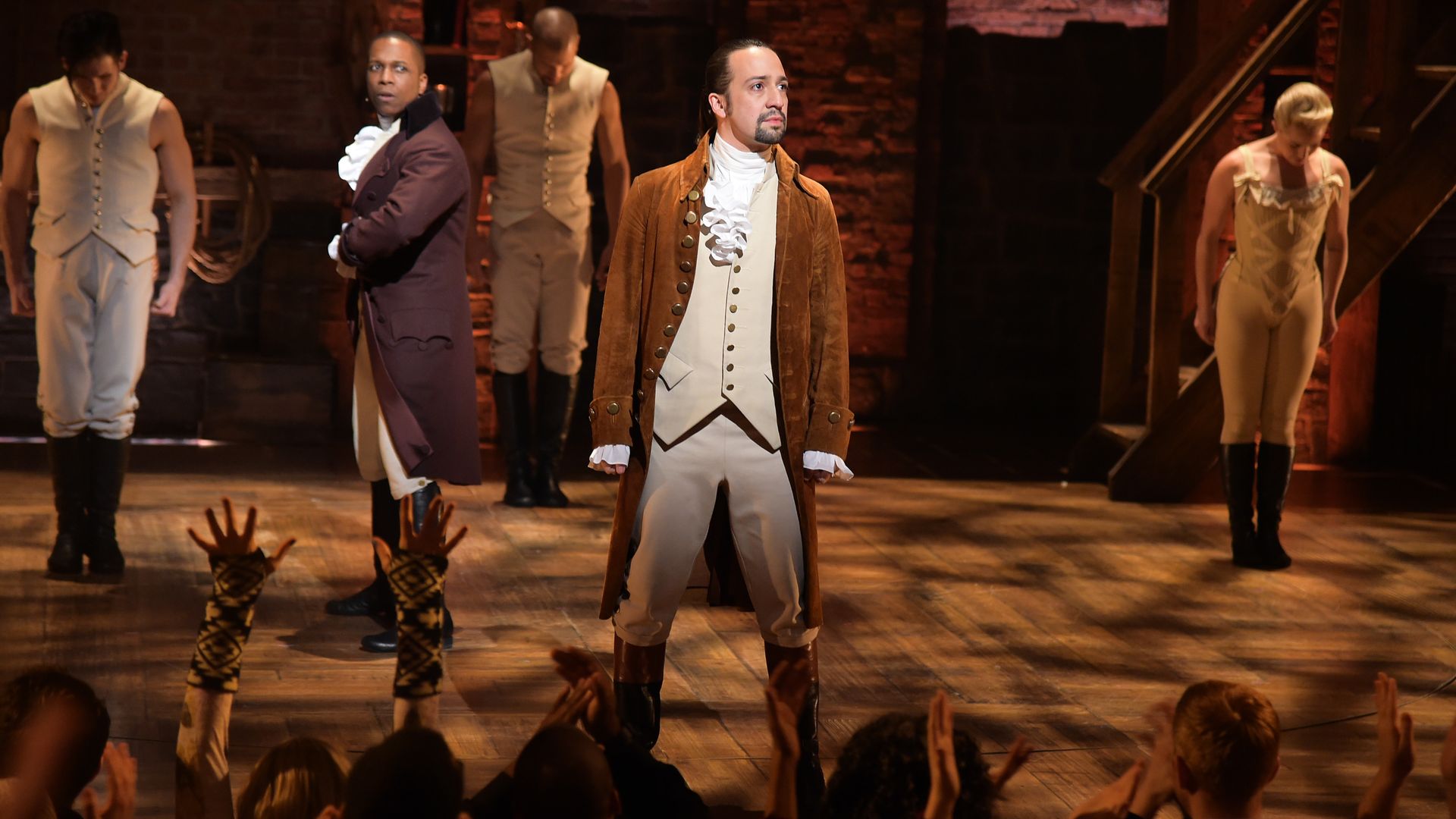 Actor Leslie Odom, Jr. (L) and actor, composer Lin-Manuel Miranda (R) and cast of "Hamilton" perform on stage during a GRAMMY performance on February 15, 2016 in New York City. 