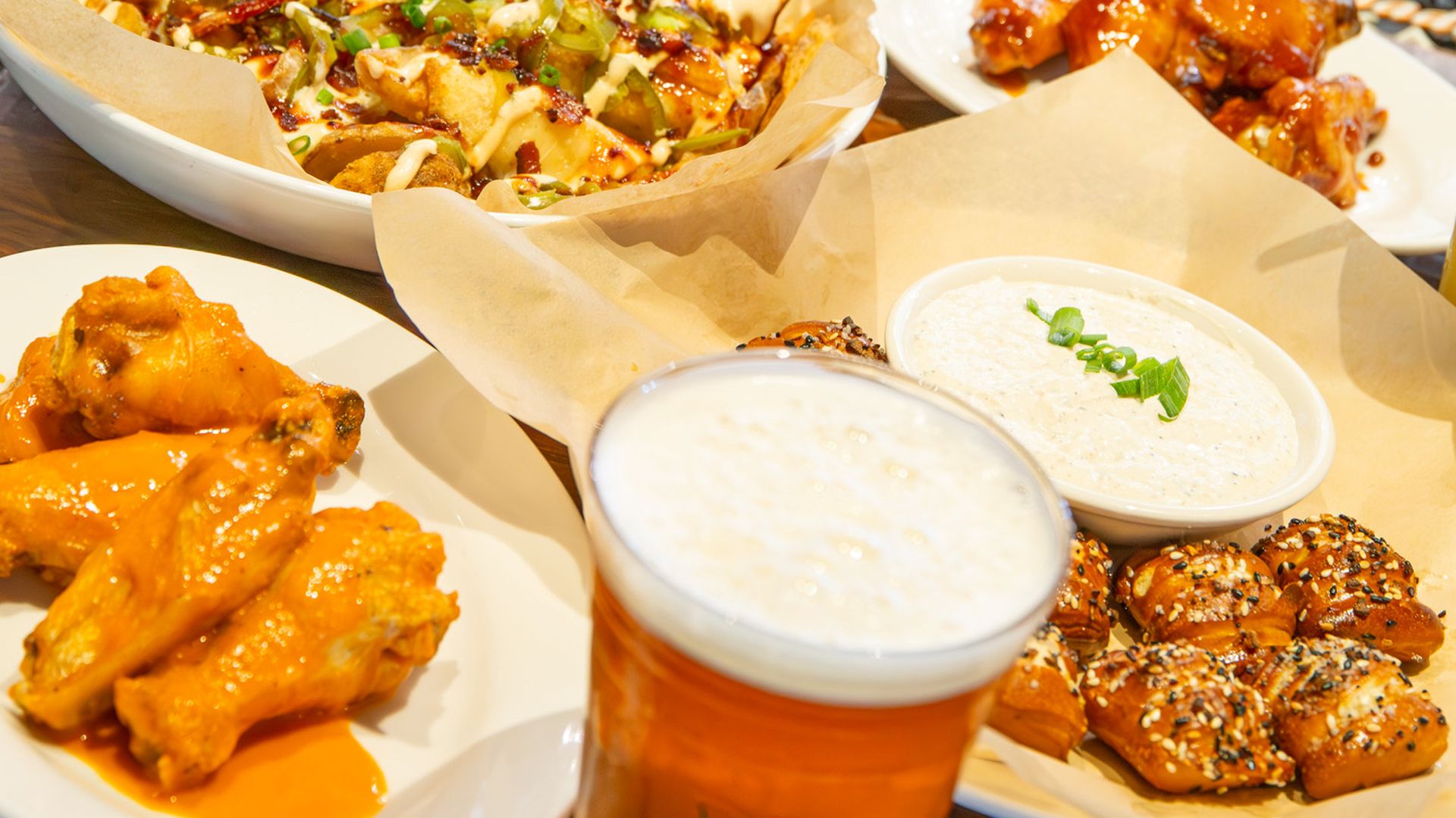 A spread of Crooked Hammock Brewing food and drinks