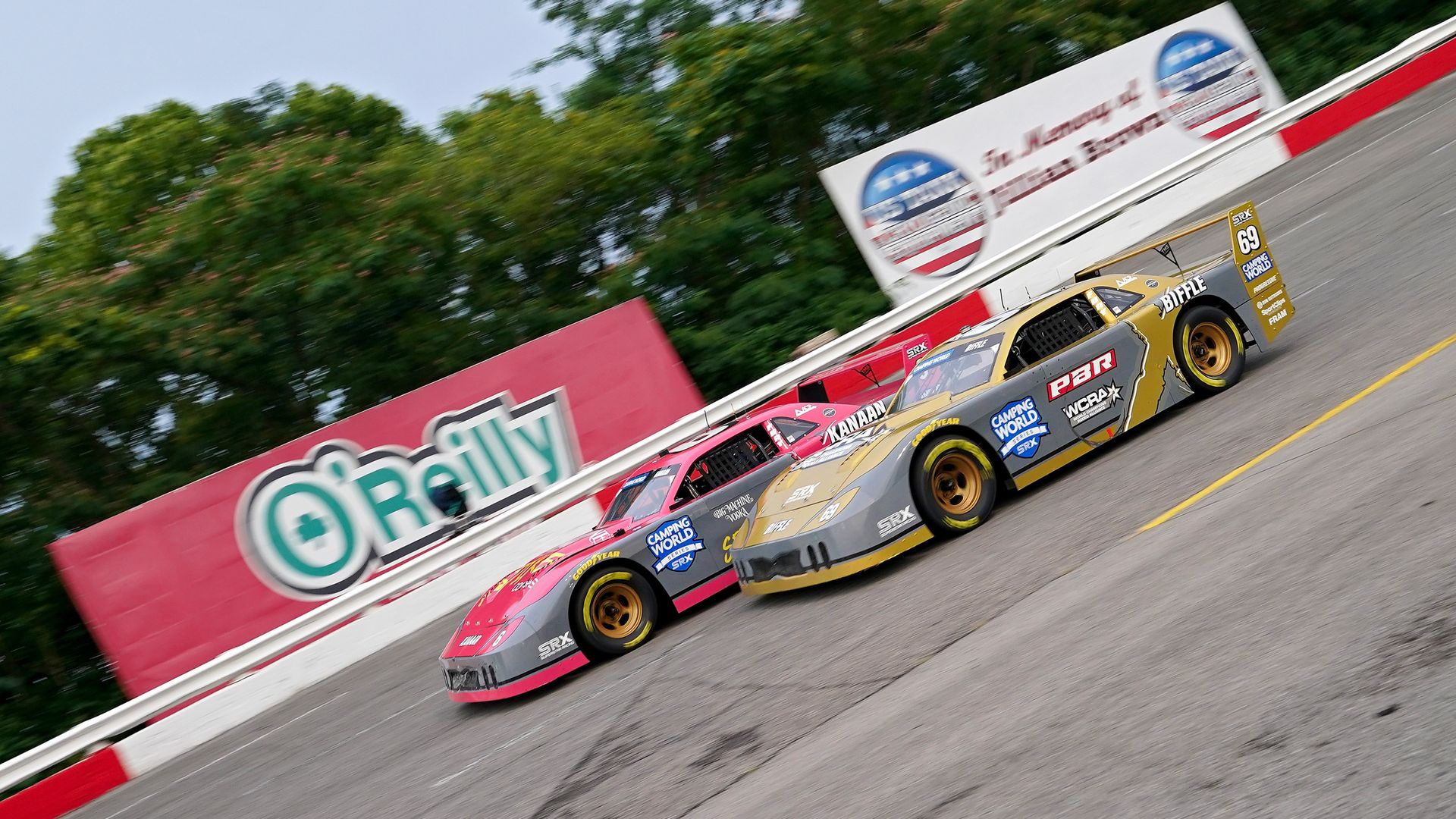 Tony Kanaan #6 and Greg Biffle #69 drive during the Camping World Superstar Racing Experience at Nashville Fairgrounds Speedway on July 09, 2022 in Nashville, Tennessee.
