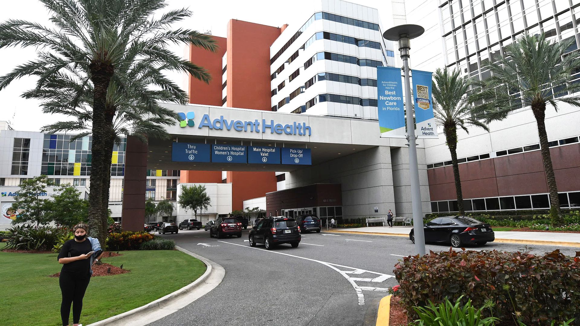 AdventHealth hospital in Orlando is seen on the day that hospital officials reported they were elevating to level red with a full ICU and more than 900 patients hospitalized with COVID-19