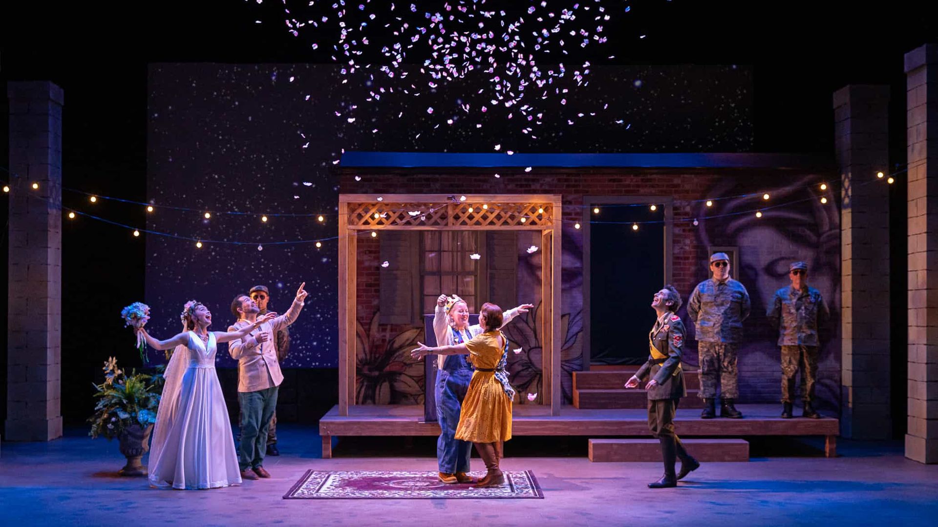 Actors on stage under confetti in OrpheusPDX’s production of Mozart’s “The Royal Shepard.”