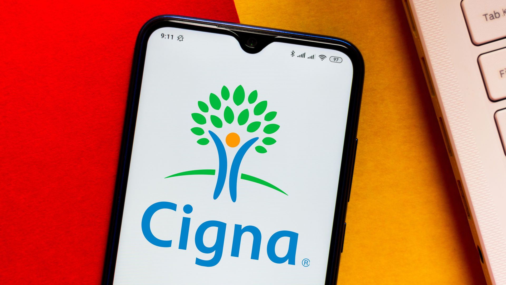 The Cigna logo on a smartphone.