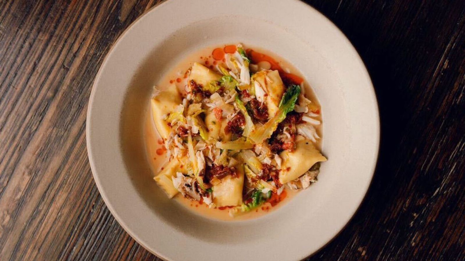 A plate of crab agnolotti served at Coquette. 