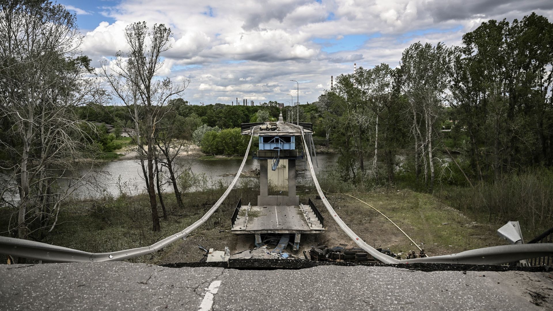 A picture taken on May 22, 2022, shows the destroyed bridge connecting the city of Lysychansk with the city of Severodonetsk in the eastern Ukranian region of Donbas.
