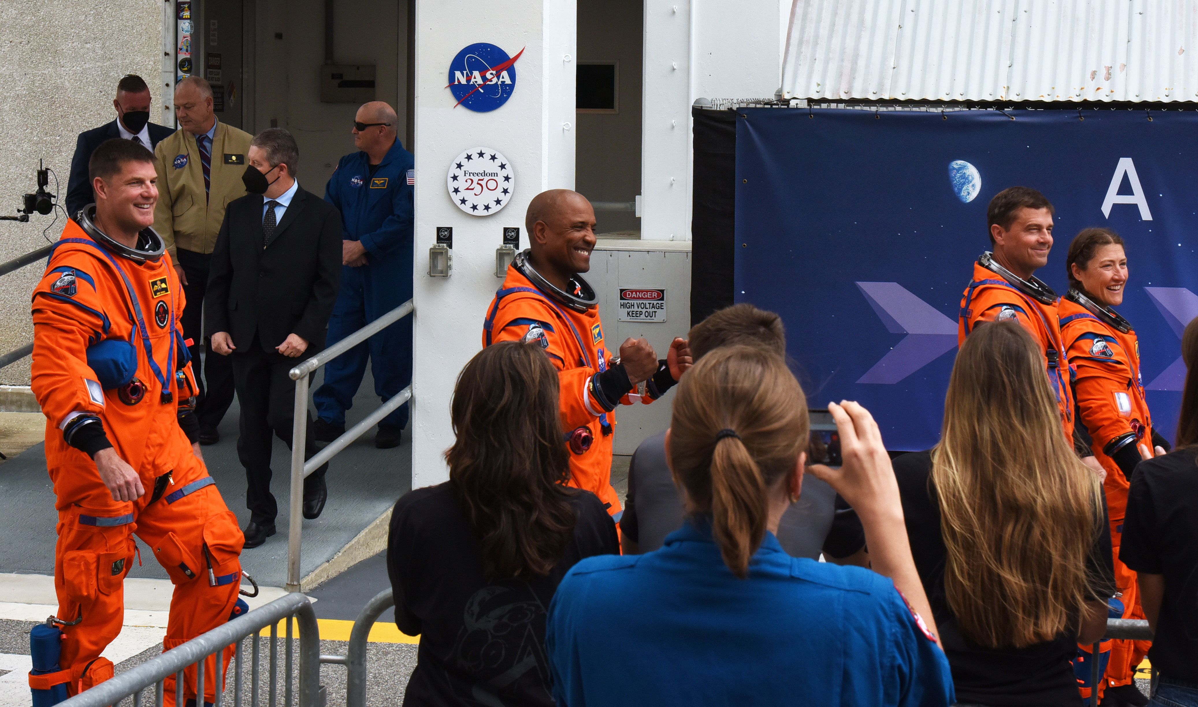 Astronauts head to launch pad