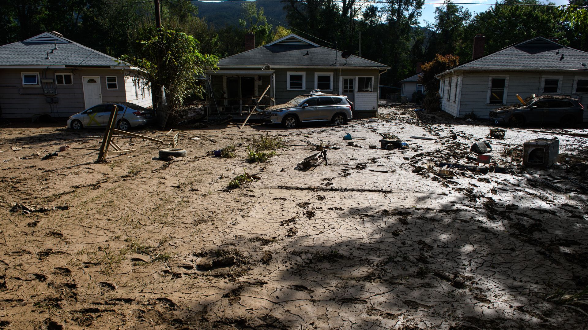 SWANNANOA, NORTH CAROLINA - OCTOBER 02: Destruction off Edwards Avenue is seen on October 2, 2024 in Swannanoa, North Carolina. According to reports, at least 160 people have been killed across the southeastern U.S., and more than a million are without power due to the storm. The White House has app