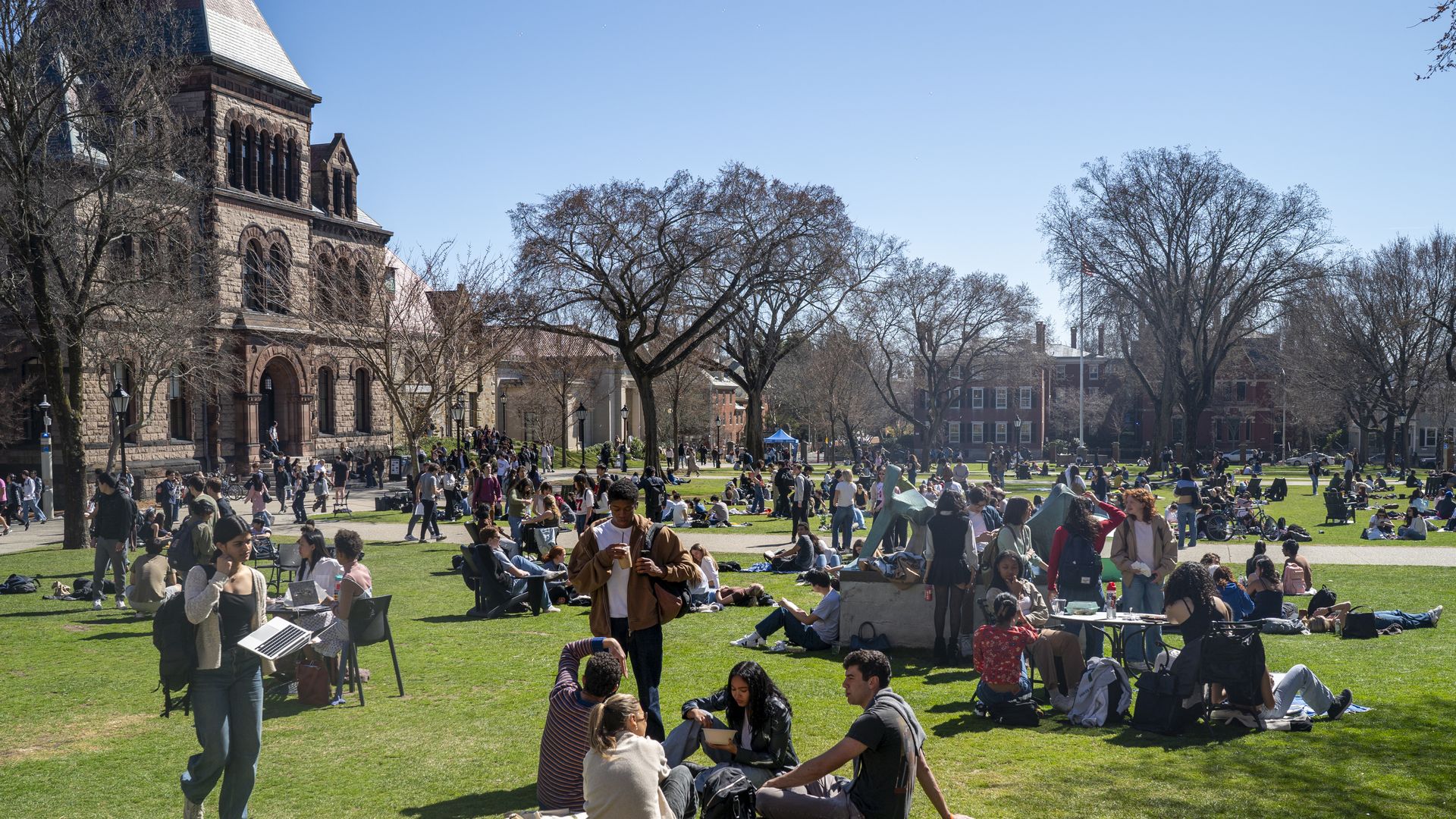 Students attending Brown University walk through the main campus March 19, 2025 in Providence, Rhode Island. (Photo by Robert Nickelsberg/Getty Images)
