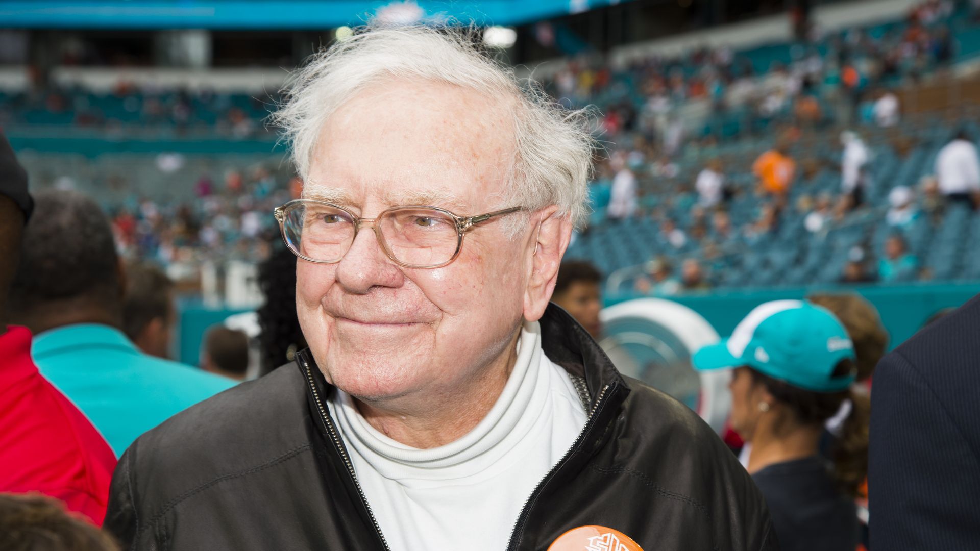 Warren Buffett on the sidelines before the start of the NFL football game between the Arizona Cardinals and the Miami Dolphins on December 11, 2016 in Miami Gardens, FL.