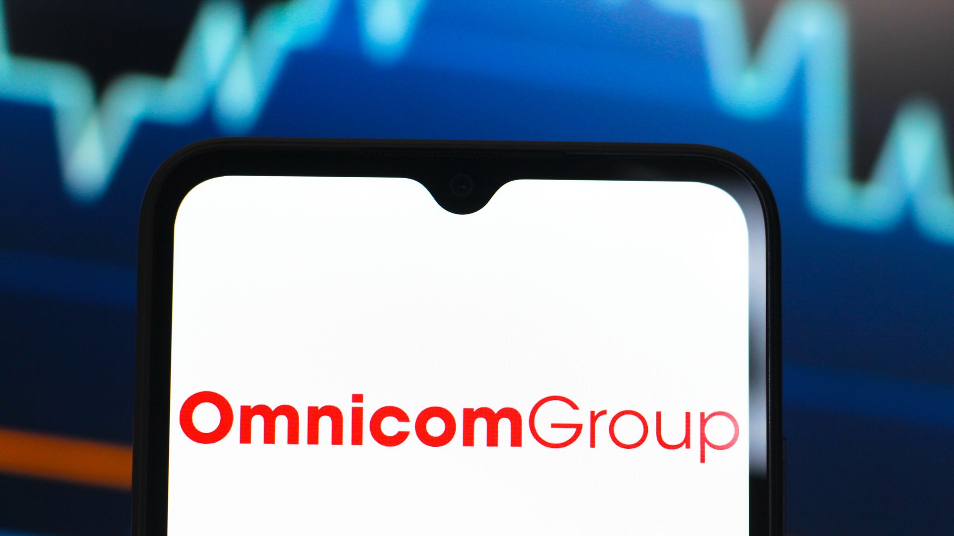 CANADA - 2025/03/12: In this photo illustration, the Omnicom Group logo is seen displayed on a smartphone screen. (Photo Illustration by Thomas Fuller/SOPA Images/LightRocket via Getty Images)