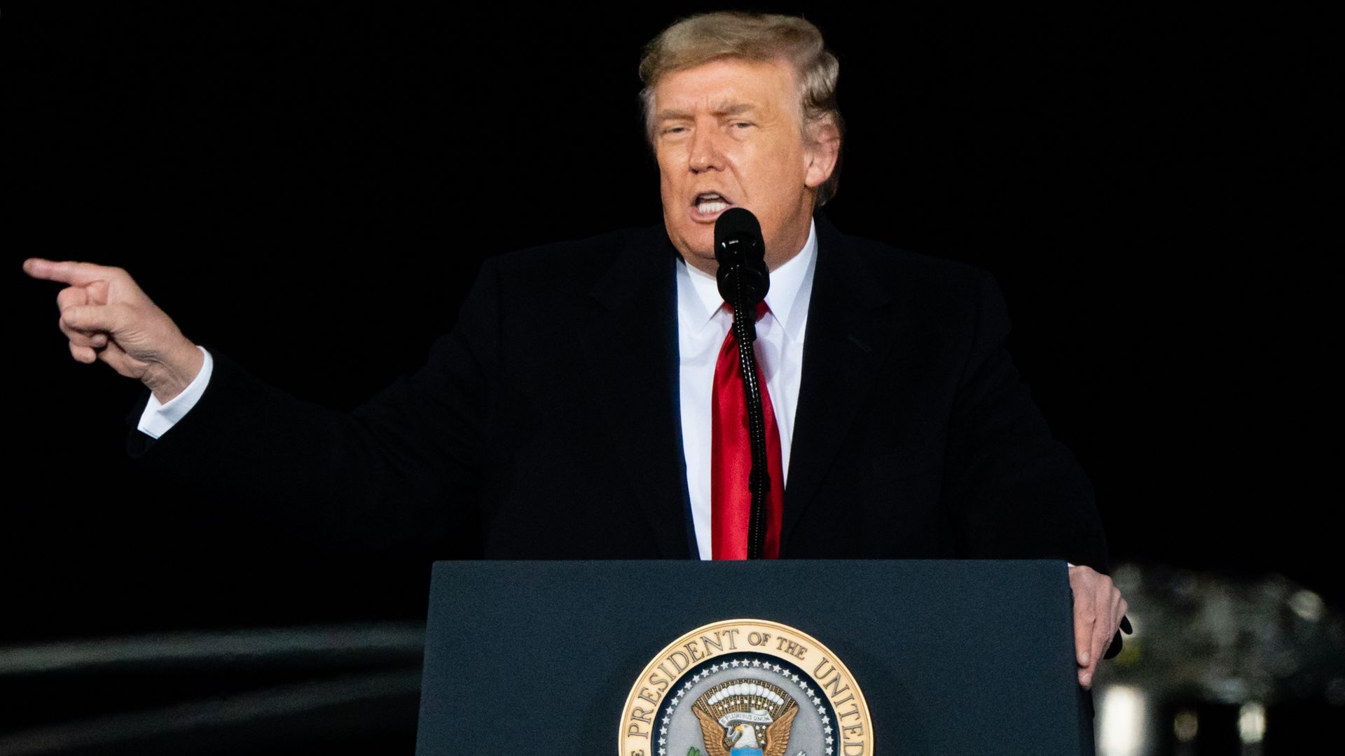 U.S. President Donald Trump speaks during a campaign rally for Senators Kelly Loeffler and David Perdue in Atlanta, Georgia