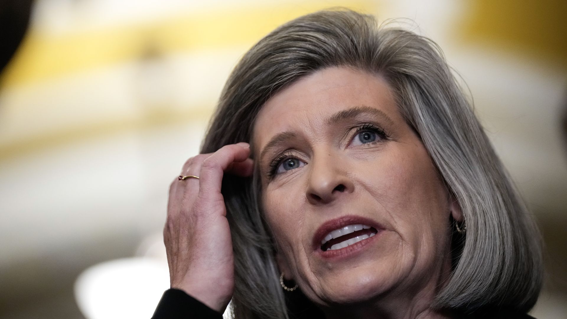 Sen. Joni Ernst (R-IA) speaks to reporters after a closed-door lunch meeting with Senate Republicans at the U.S. Capitol October 24, 2023 in Washington, DC. 