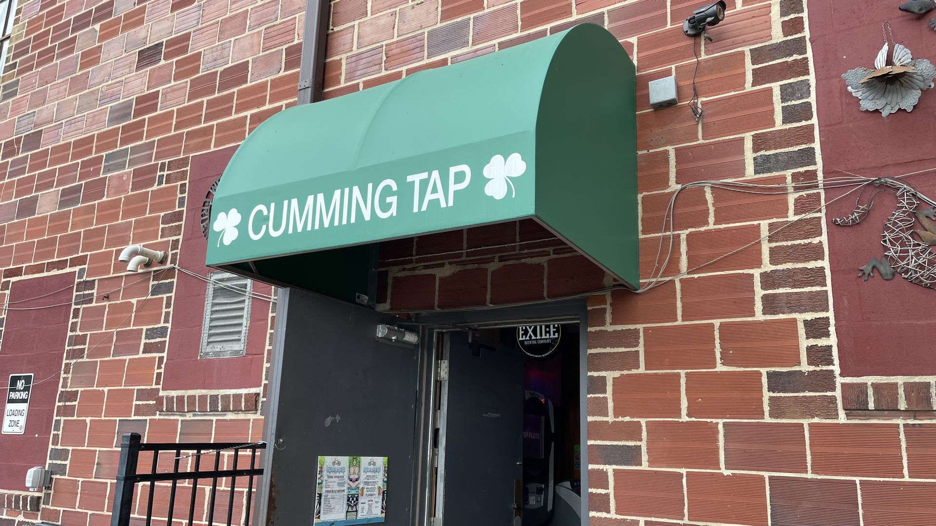 The front of Cumming Tap, a bar in Cumming, Iowa.