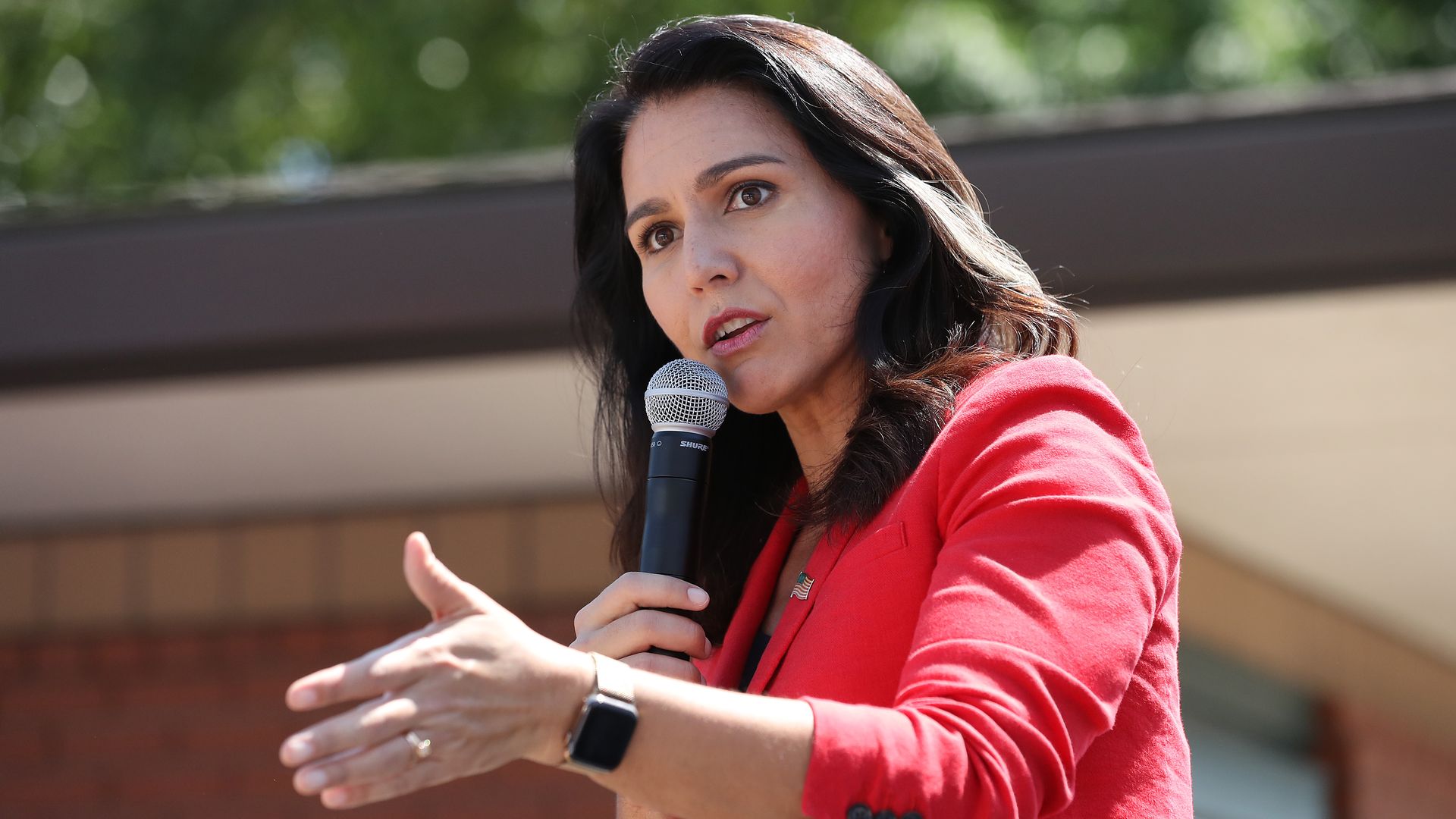 Democratic presidential candidate Rep. Tulsi Gabbard (D-HI) delivers a campaign speech at the Des Moines Register Political Soapbox during the Iowa State Fair 