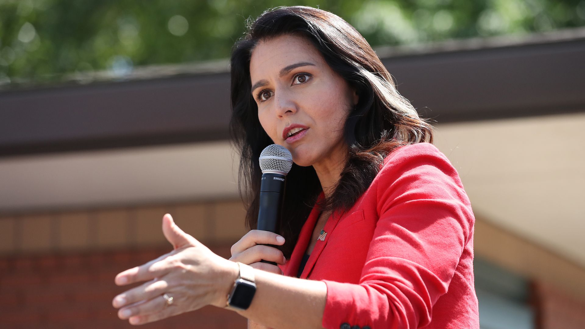 Democratic presidential candidate Rep. Tulsi Gabbard (D-HI) delivers a campaign speech at the Des Moines Register Political Soapbox during the Iowa State Fair