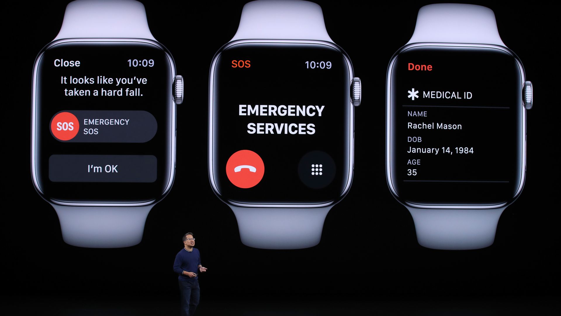 Apple's Stan Ng speaks on a stage in front of photos of an Apple Watch