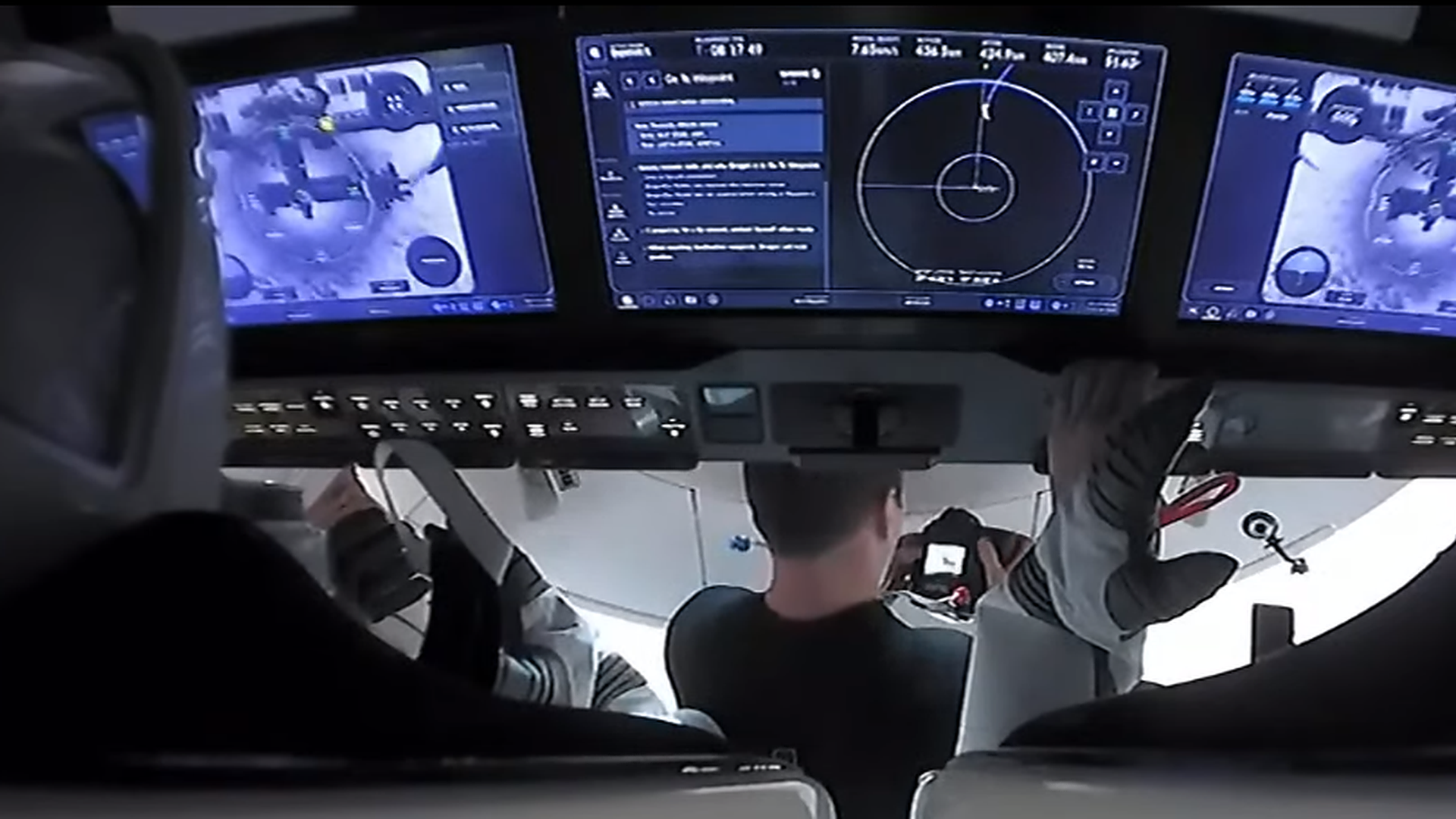 ew-2 Commander Shane Kimbrough and Pilot Megan McArthur monitor data inside Crew Dragon during their return to Earth on Nov. 8, 2021. 
