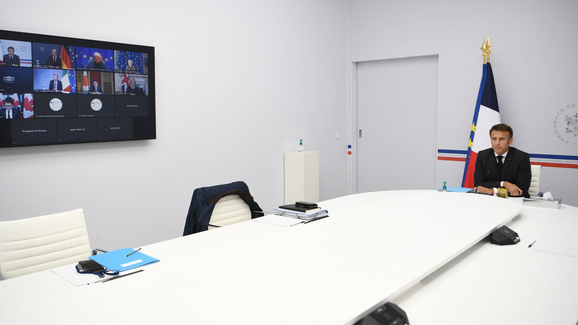 France's President Emmanuel Macron participates in a video conference with G7 leaders on the situation in Ukraine, at the Hotel Marigny in Paris on October 11, 2022