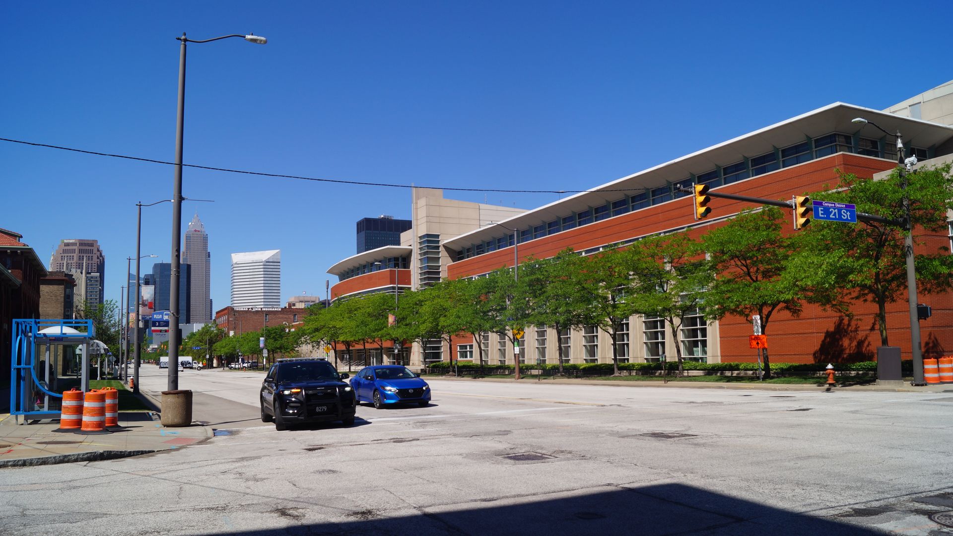 A red brick two story building on street 