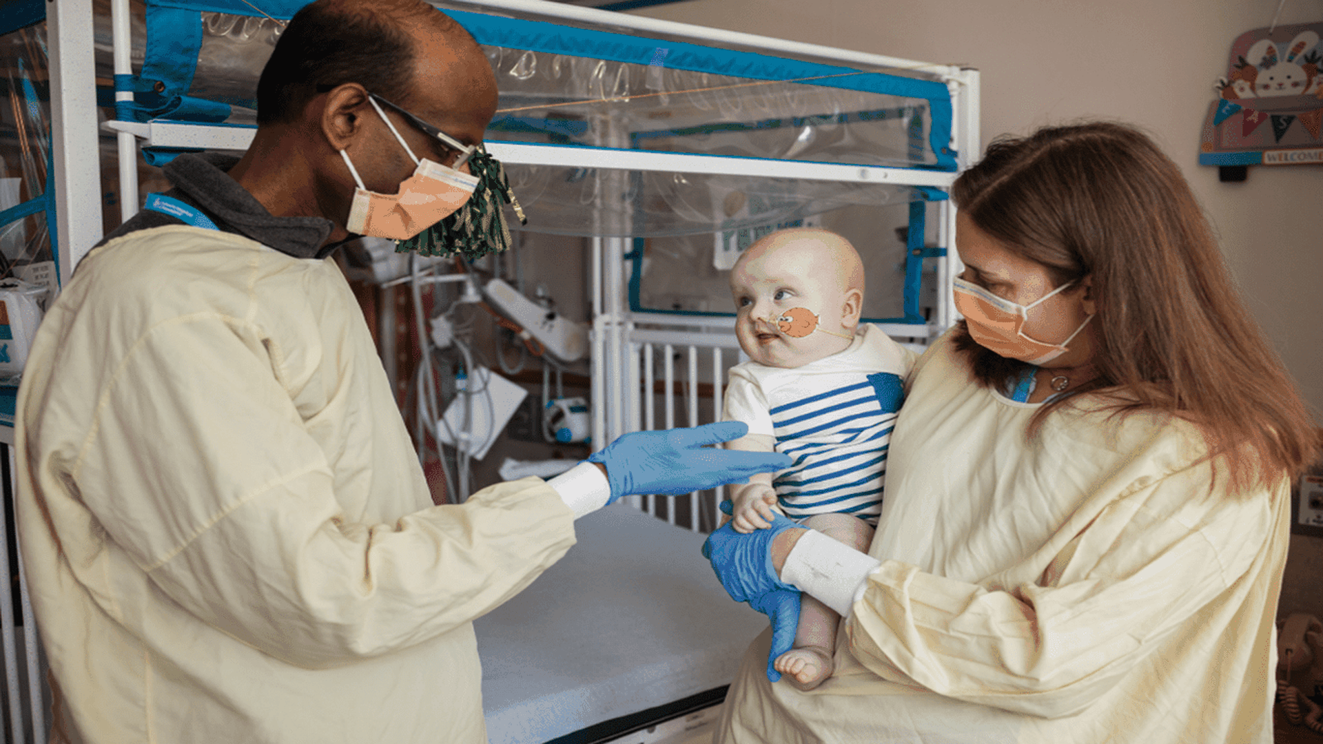 Rebecca Ahrens-Nicklas, MD, PhD, and Penn Medicine's Kiran Musunuru, MD, PhD, visiting KJ at CHOP. Credit: CHOP