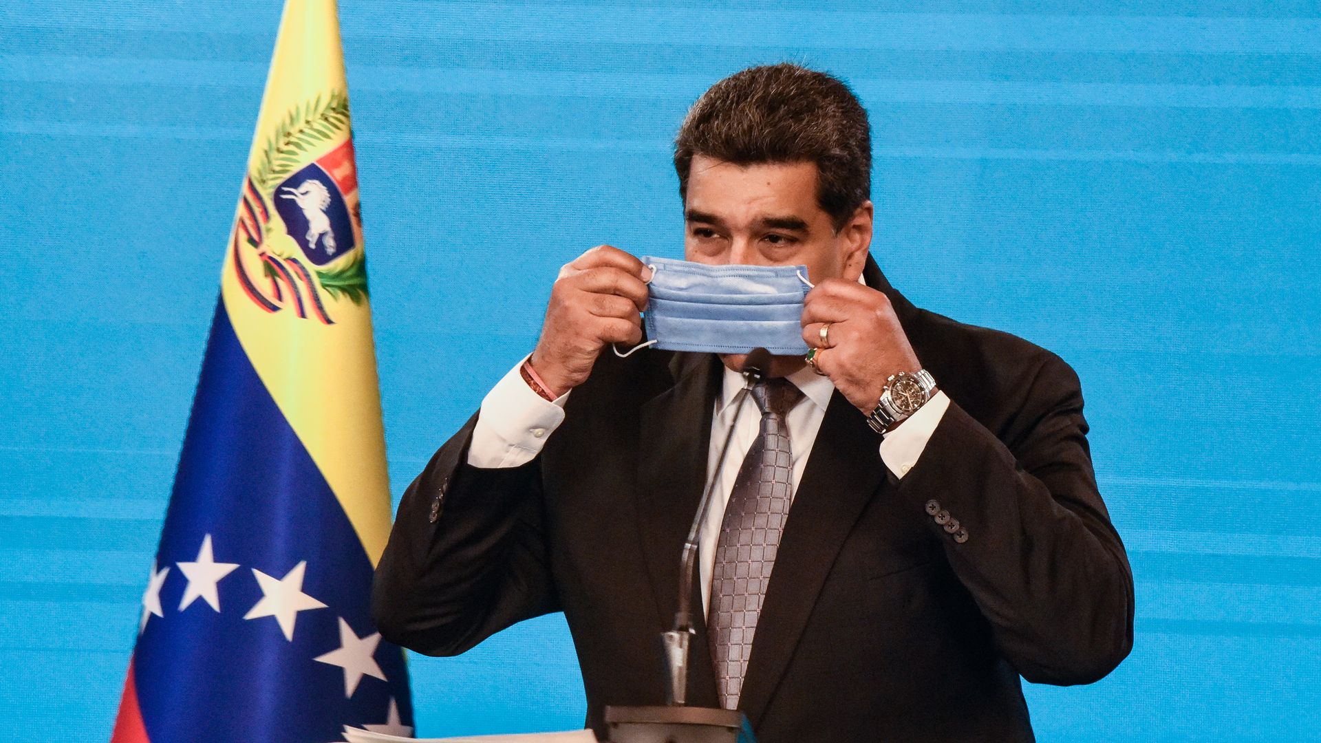 Nicolas Maduro President of Venezuela puts on his protective facemask after he gave a press conference in Miraflores Palace on February 17, 2021 in Caracas, Venezuela.