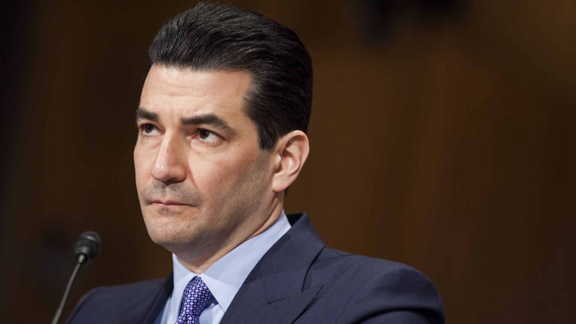 former FDA commissioner Scott Gottlieb sitting