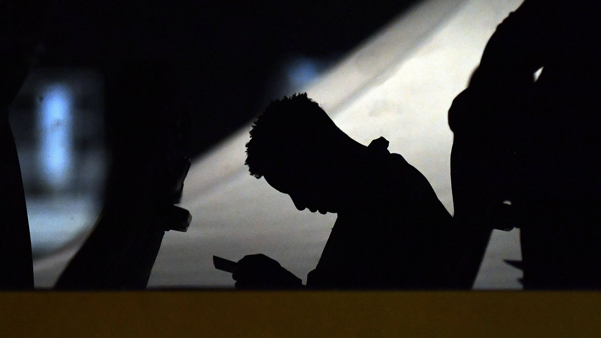 A migrant sitting on a bus