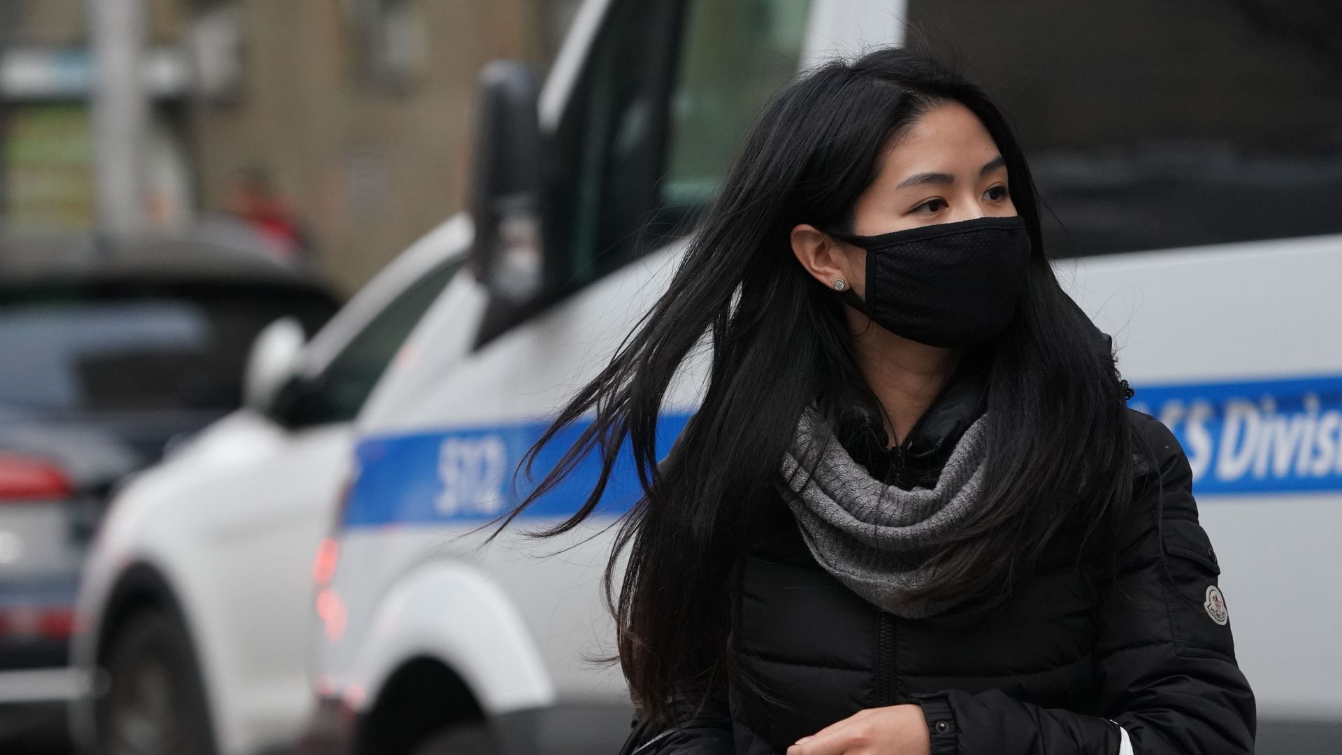 A woman wears a protective mask in New York City.