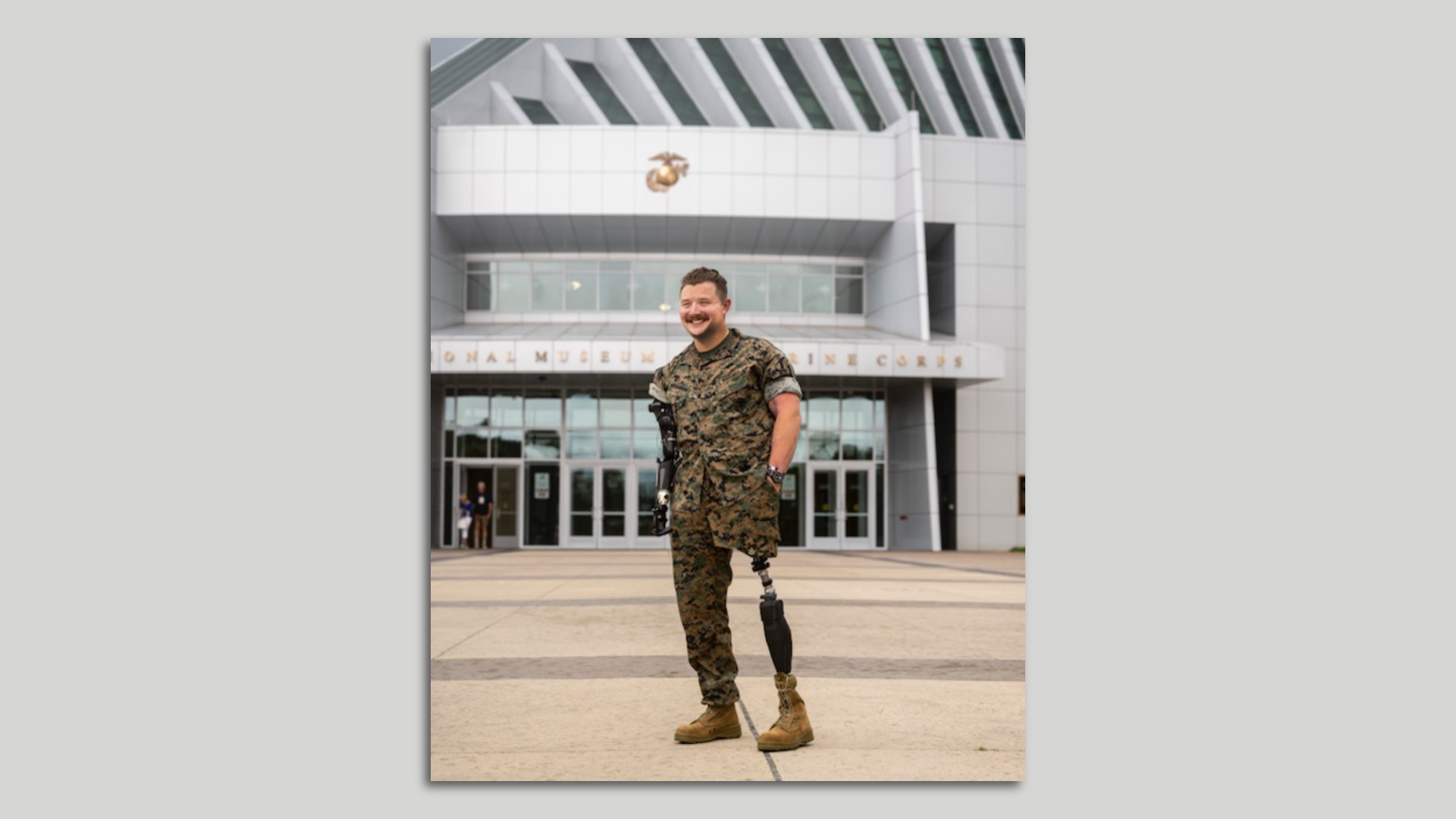 Tyler Vargas-Andrews, a double-amputee marine vet, in front of a building in DC