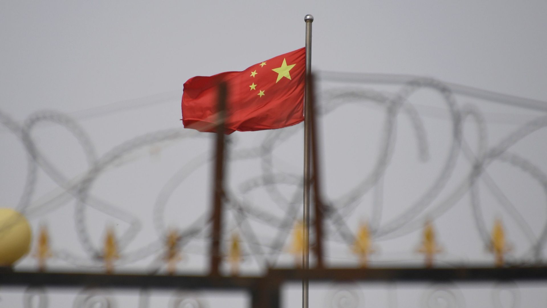 Chinese flag above internment camp