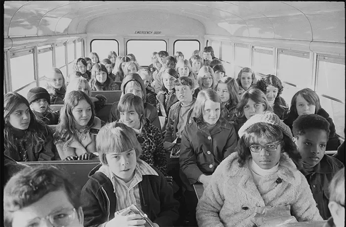 Photo of students on a bus in Charlotte in 1973