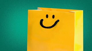 Ilustración de una bolsa de compras con el asa convirtiéndose en una carita sonriente. 