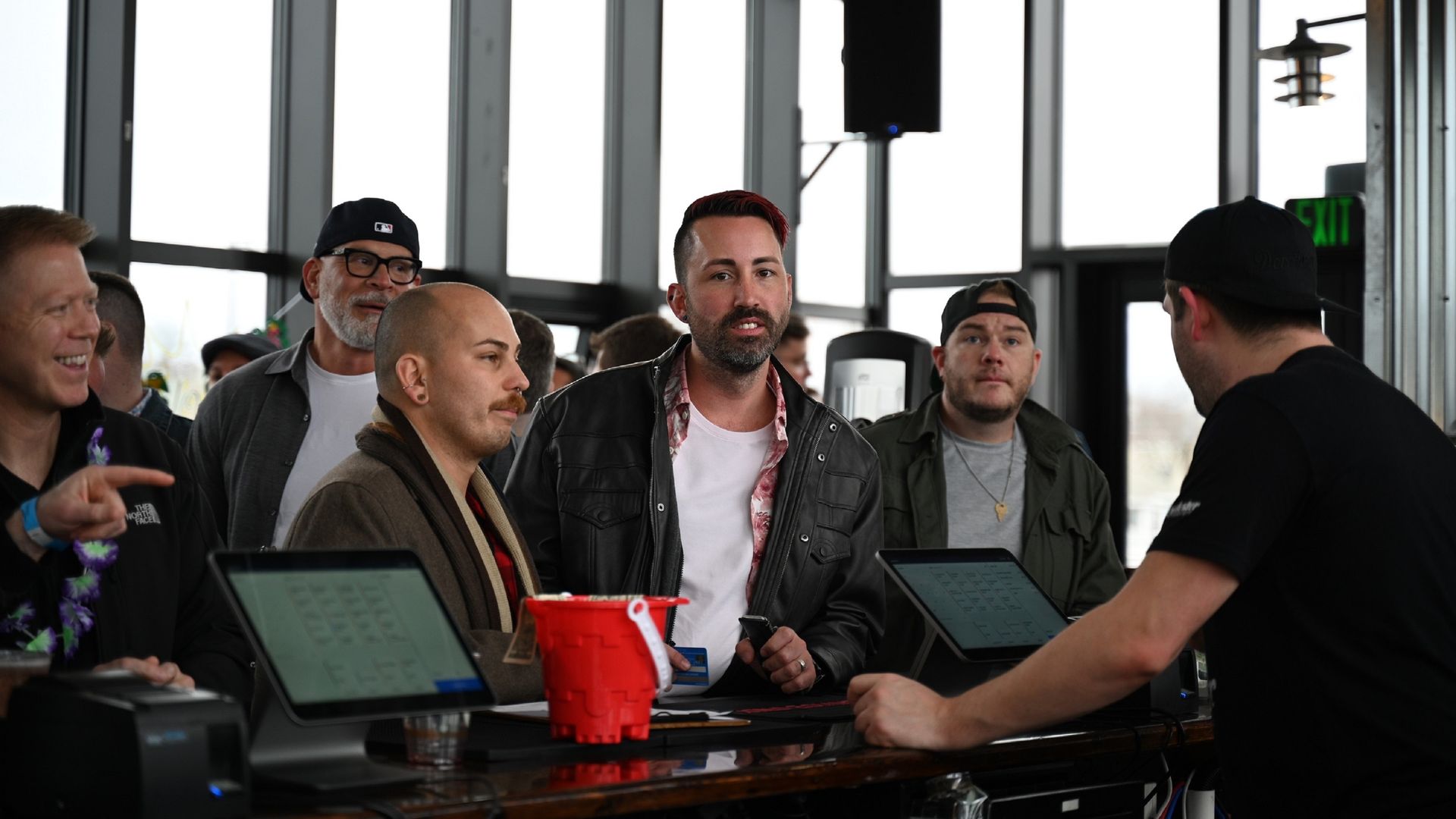 Customers wait to place orders at Dorchester Brewing Company bar.