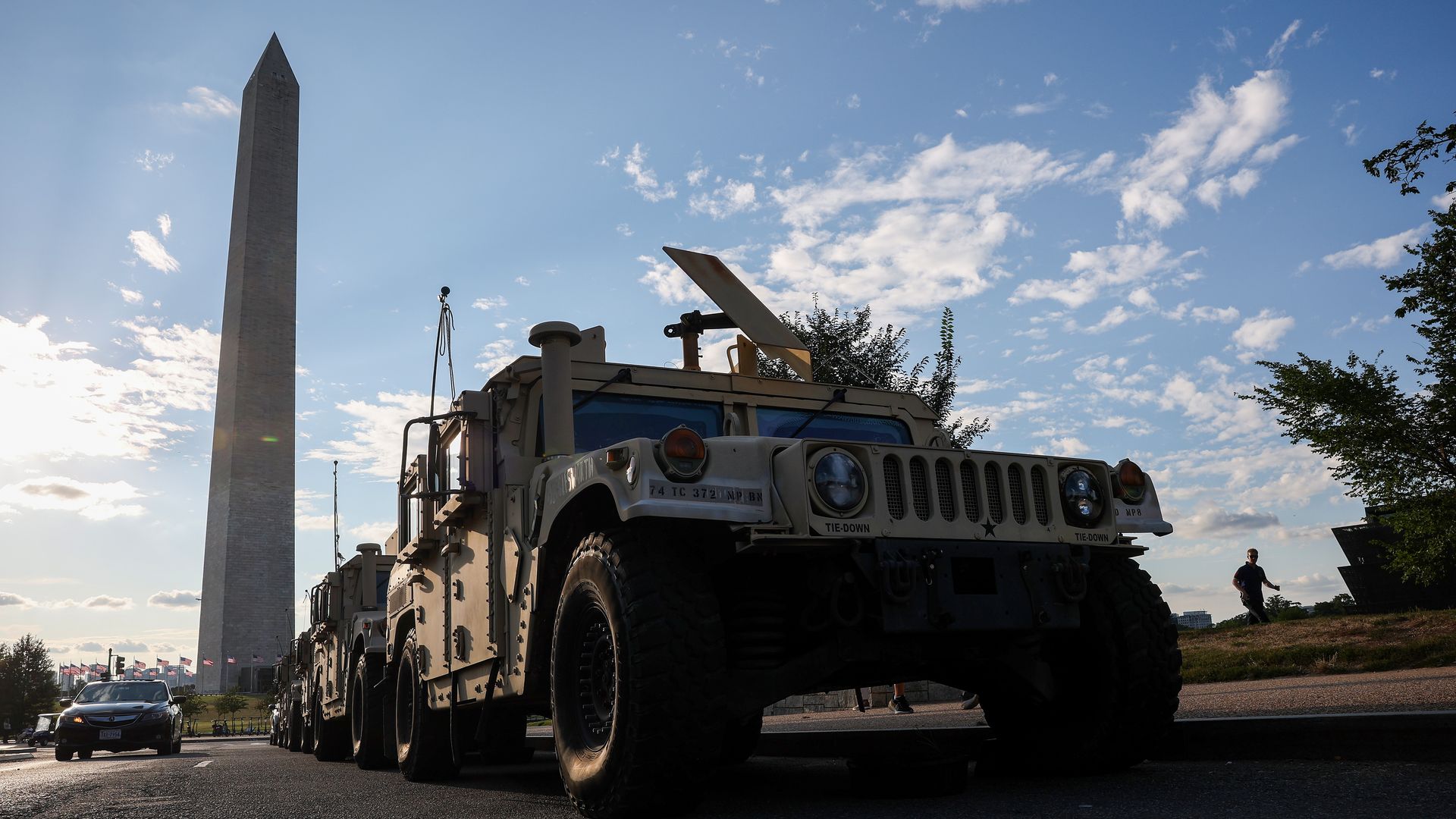 Military vehicles with the National Guard are parked near the Washington Monument on August 12, 2025. Photo: Win McNamee/Getty Images.