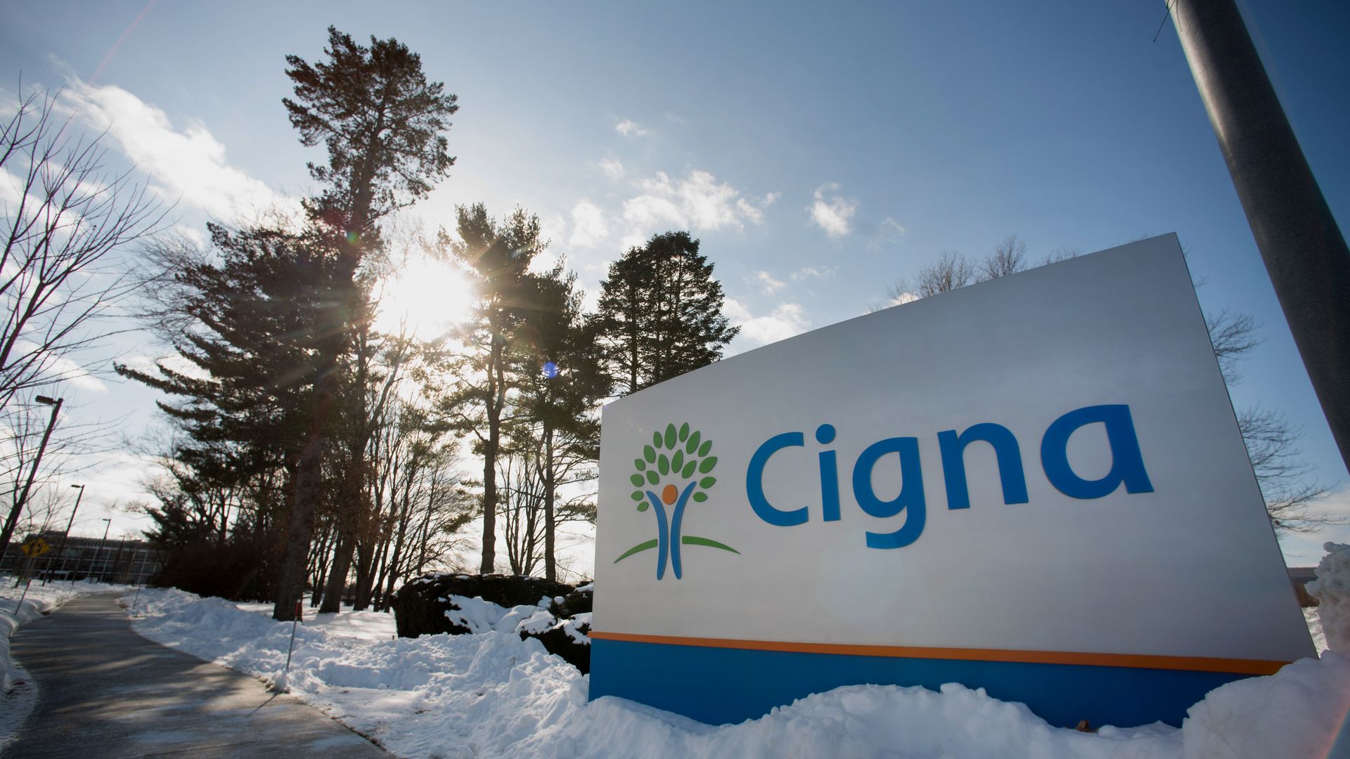 Snow covers the ground around Cigna Corp. signage displayed at the company's headquarters in Bloomfield, Connecticut, U.S., on Friday, Feb. 6, 2015. Obamacare's startup health insurance plans are flirting with financial distress, as all but five of the 23 nonprofit companies had negative cash flow f