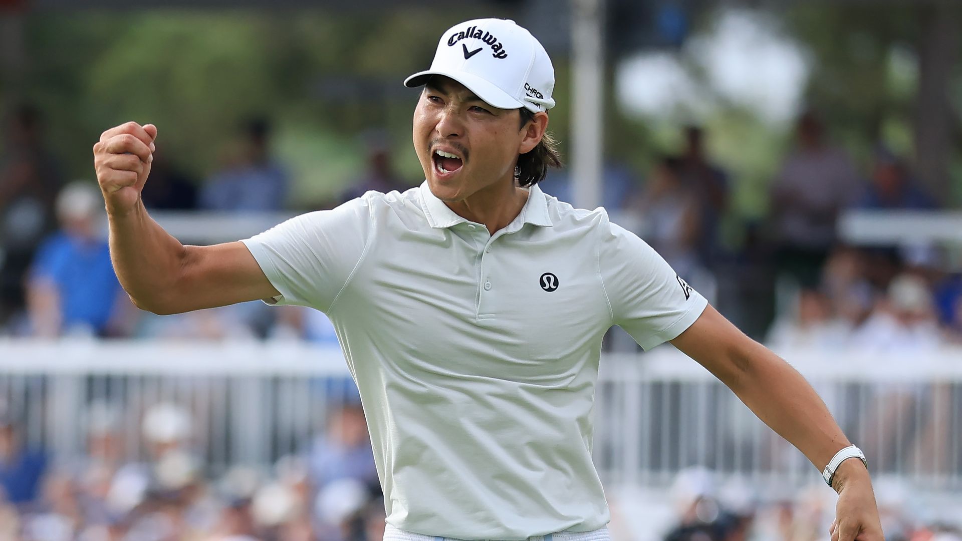Min Woo Lee celebrates after sinking a putt at the Houston Open